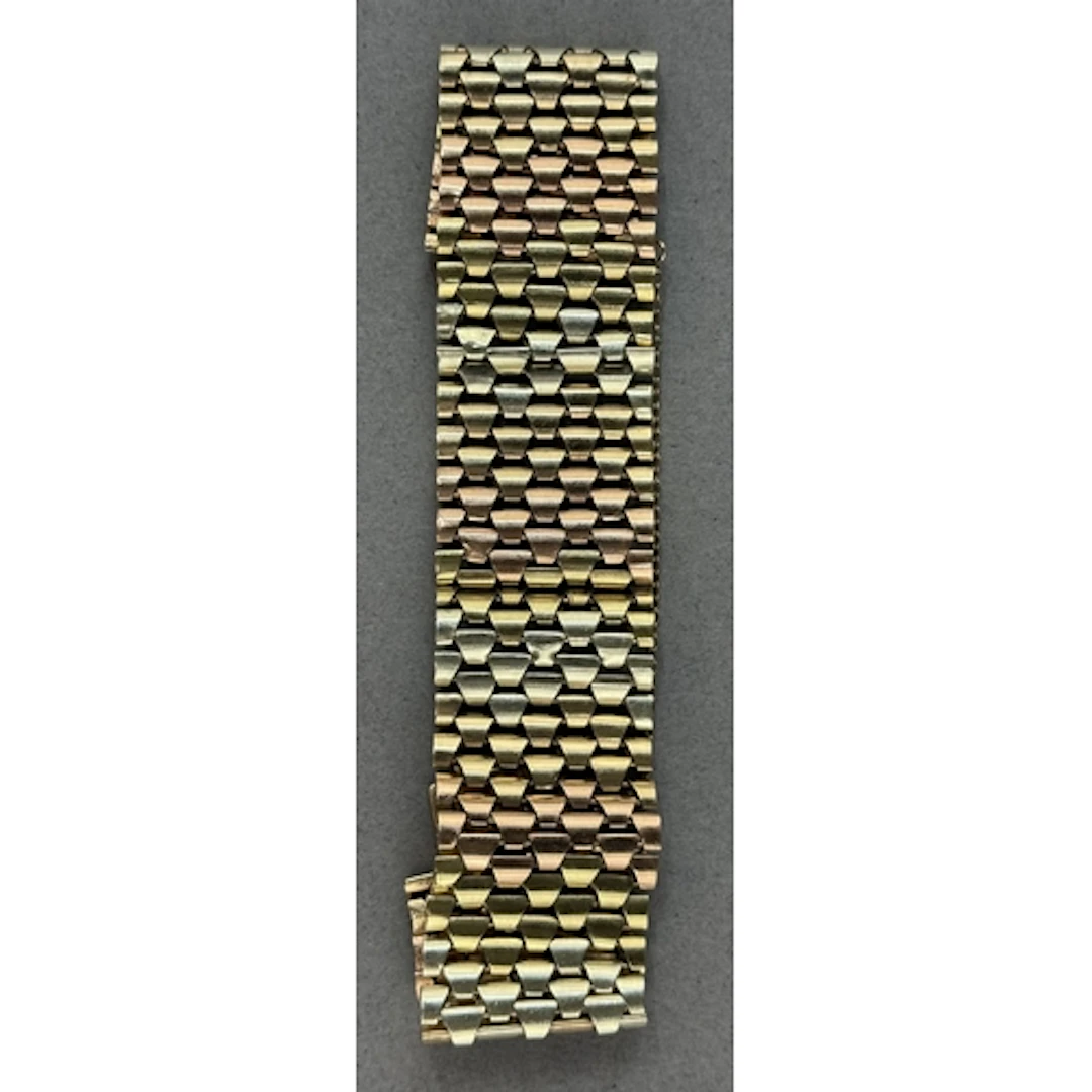 Jewellery: a 9ct three colour gold multi row link bracelet, ...