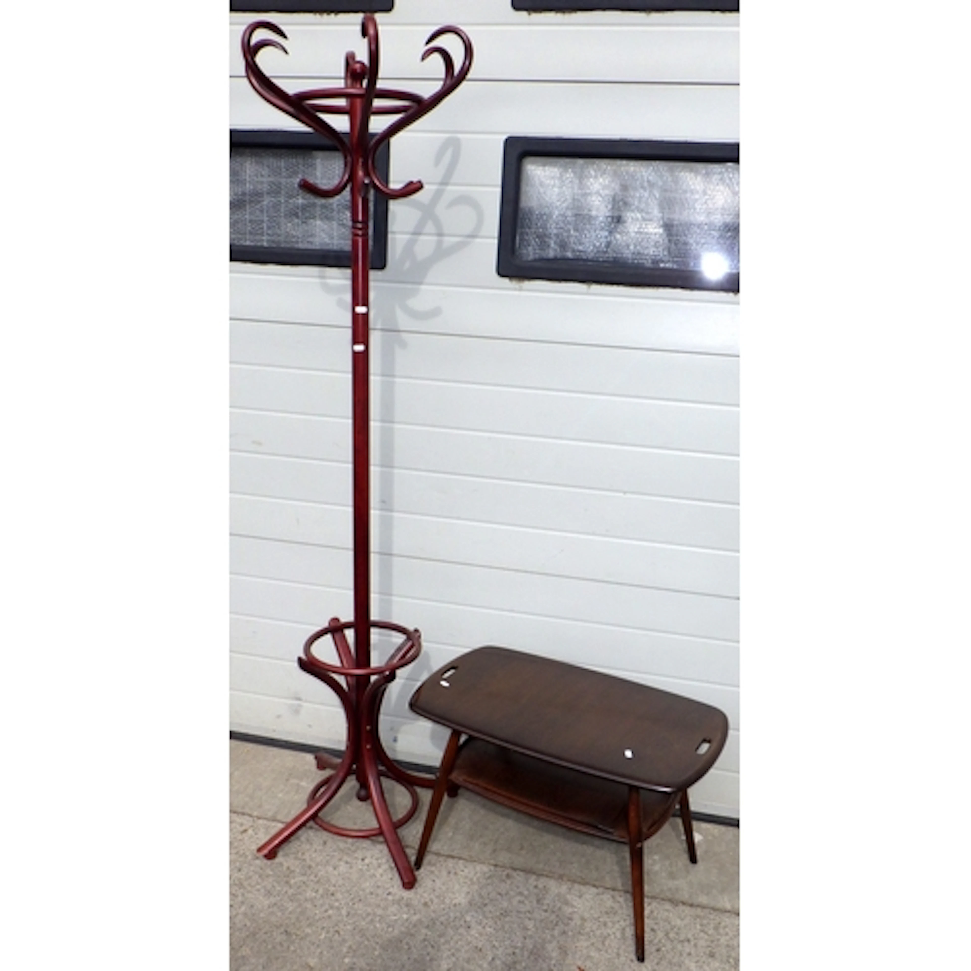 A dark Ercol coffee table together with a bentwood hat stand...