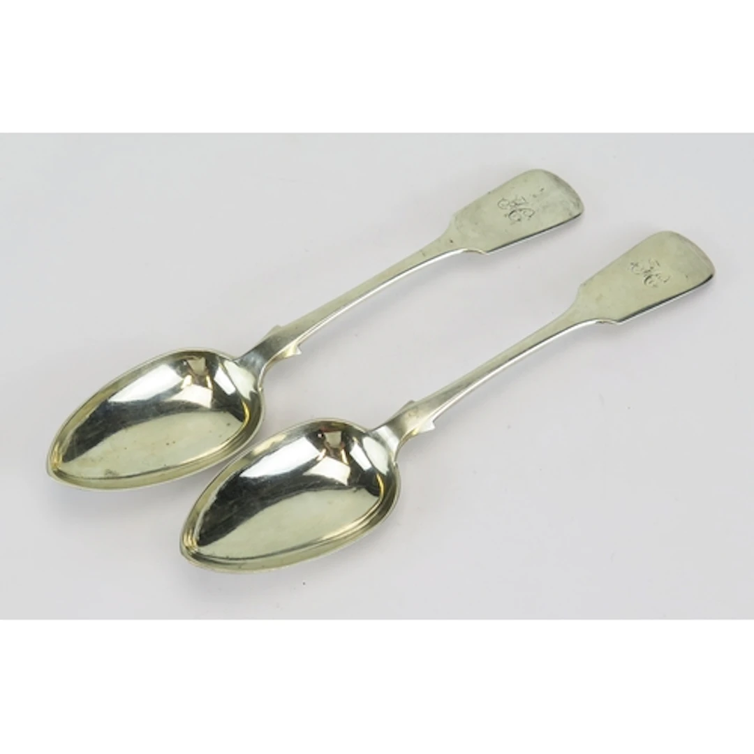 A pair of Victorian silver Old English pattern serving spoon...