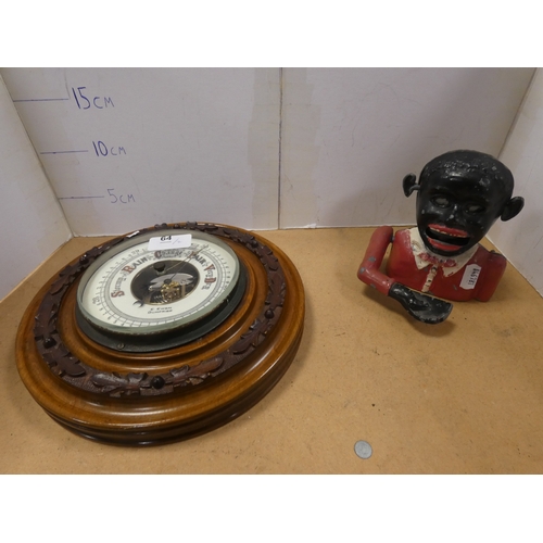Blackamoor coin bank and wall barometer, named to the dial E...