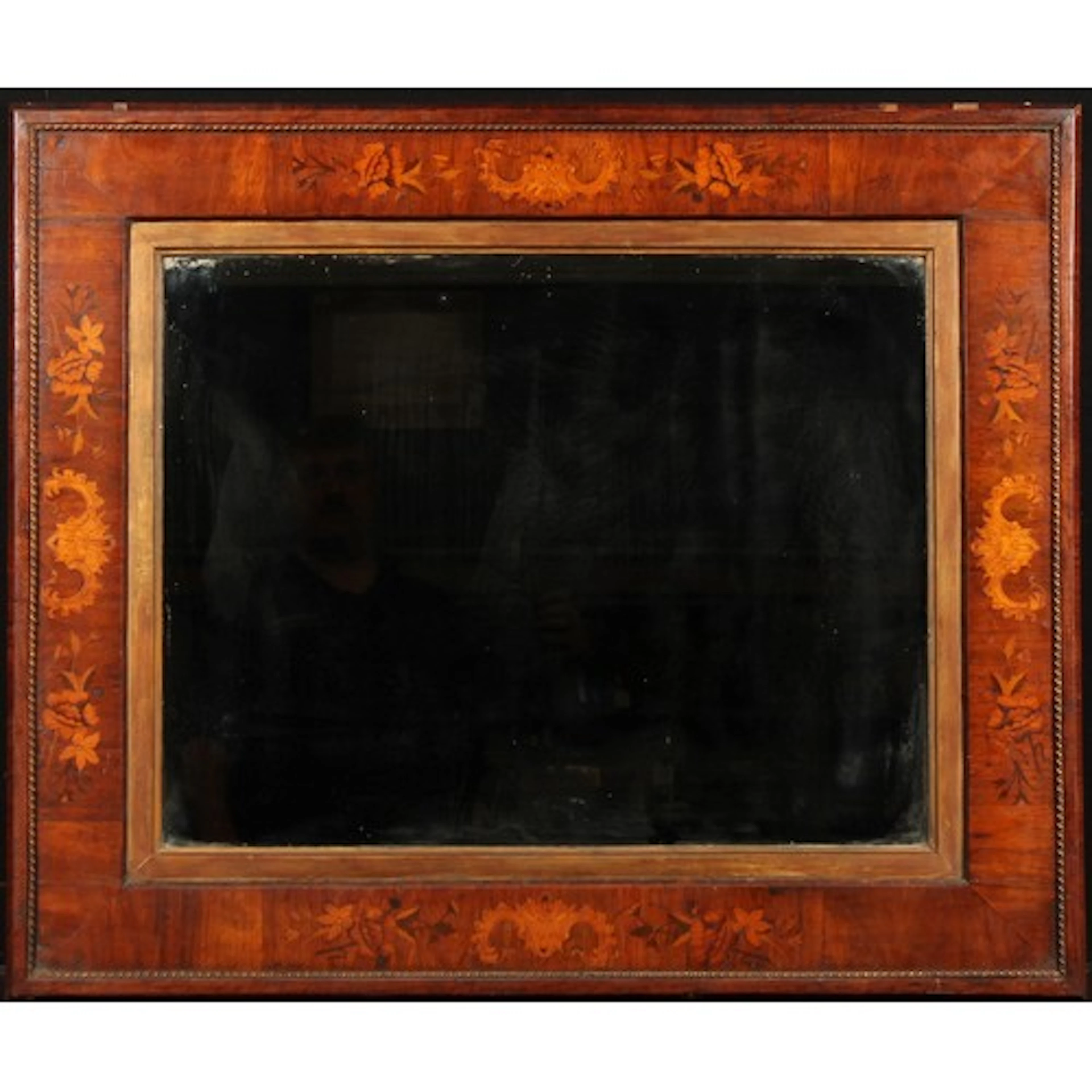 A Continental walnut and marquetry looking glass, rectangula...