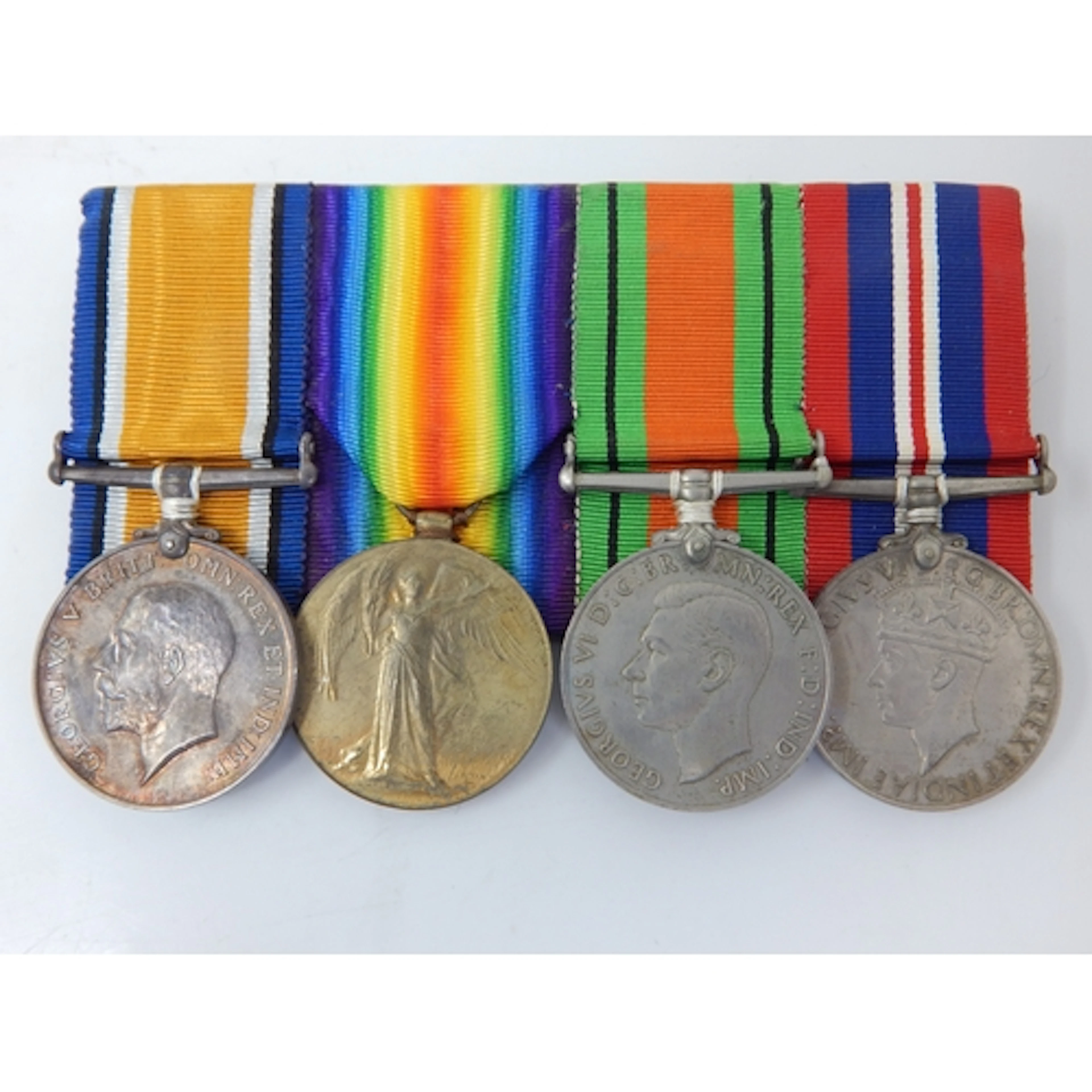 WWI Medal Pair + WWII Defence & War Medals: "2nd.LT/CAPTAIN....