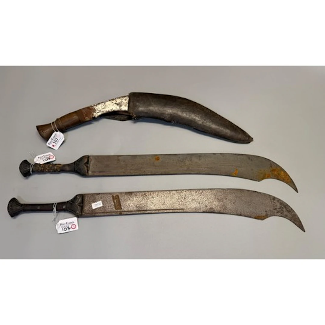 Two Chinese Dadao-style swords with carved wooden grips, bla...