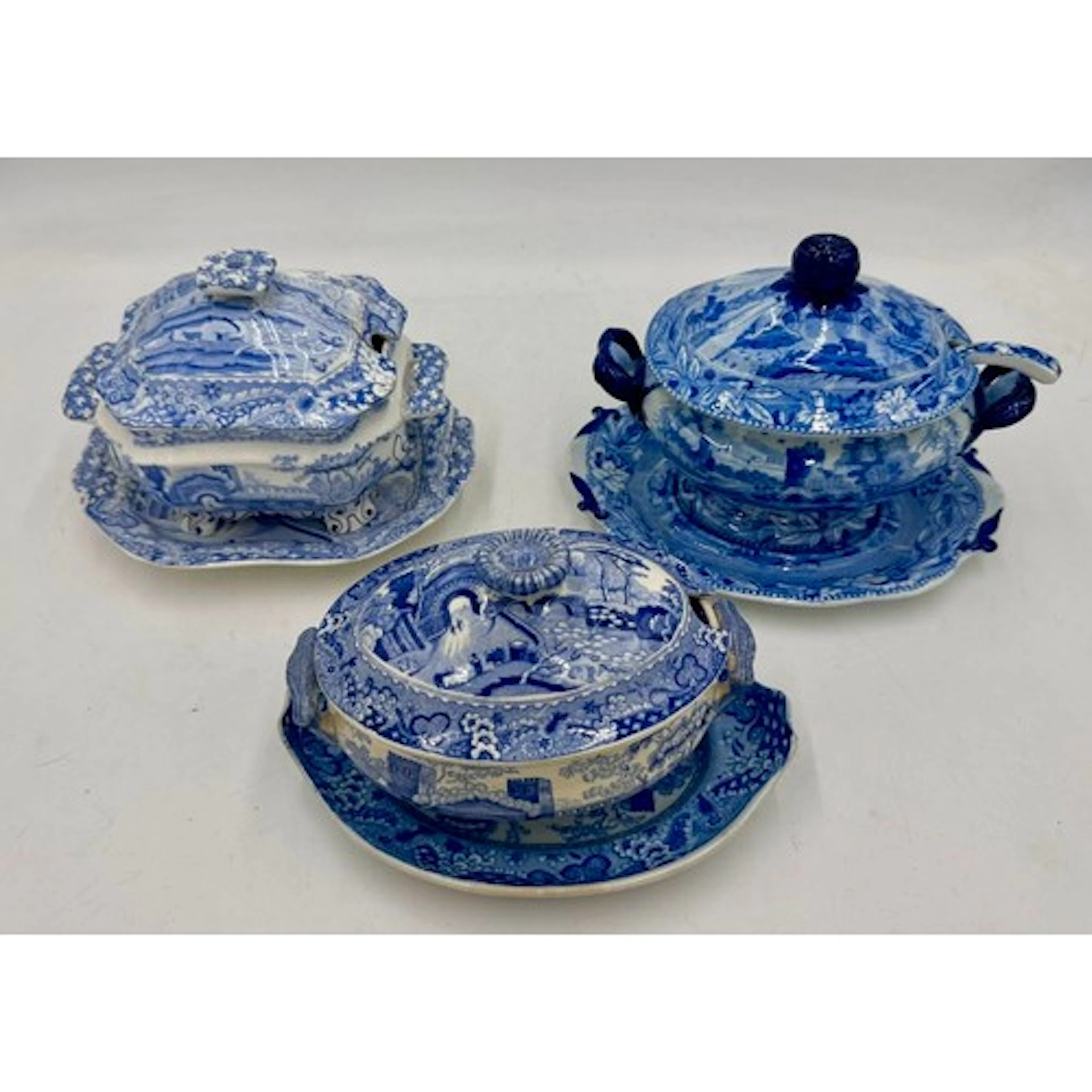 Three early 19th century blue and white transfer-printed sau...