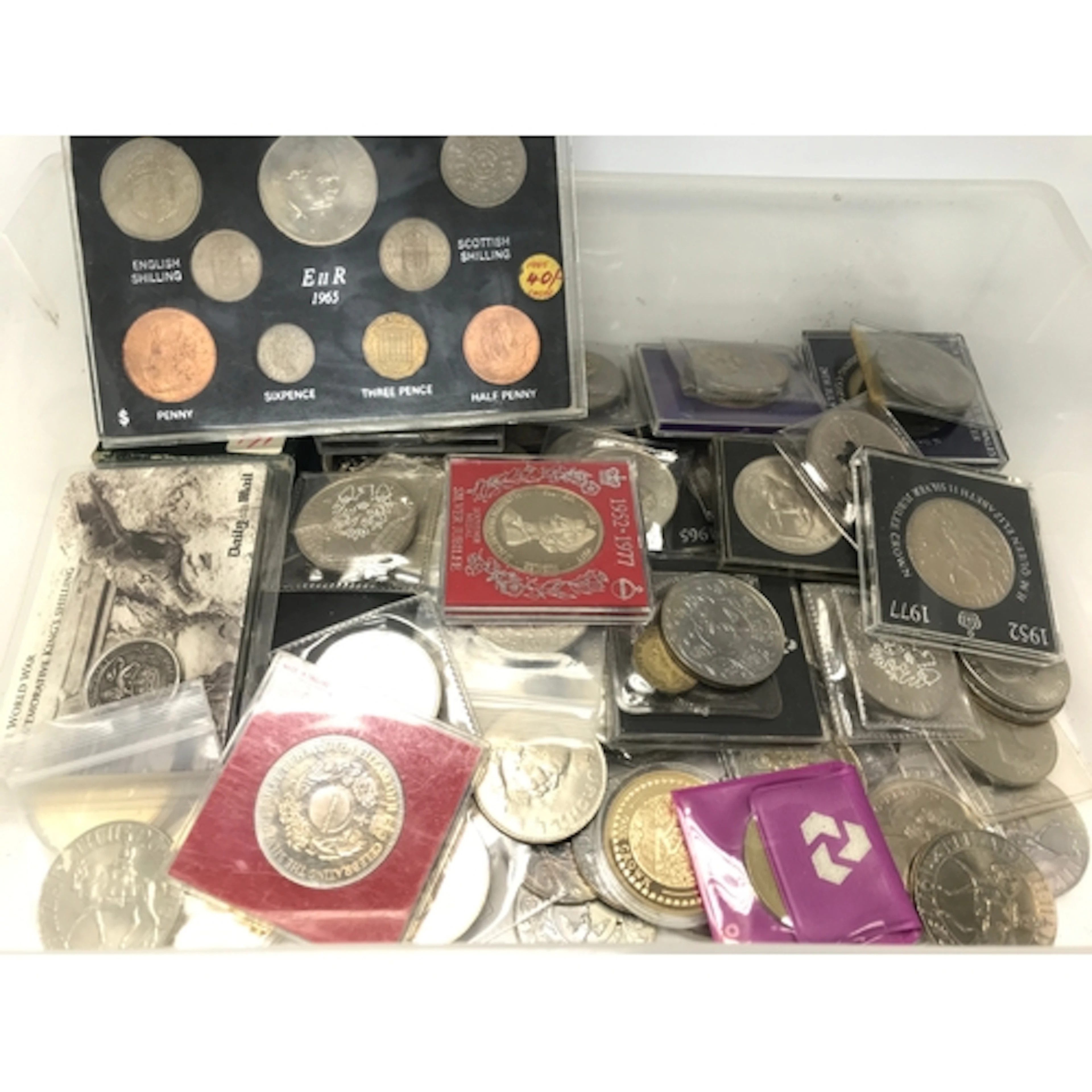 A tray of mainly crowns.