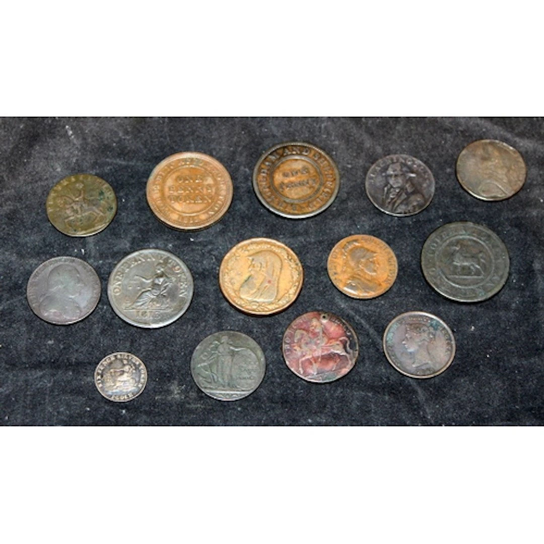 An interesting collection of trade tokens including local in...