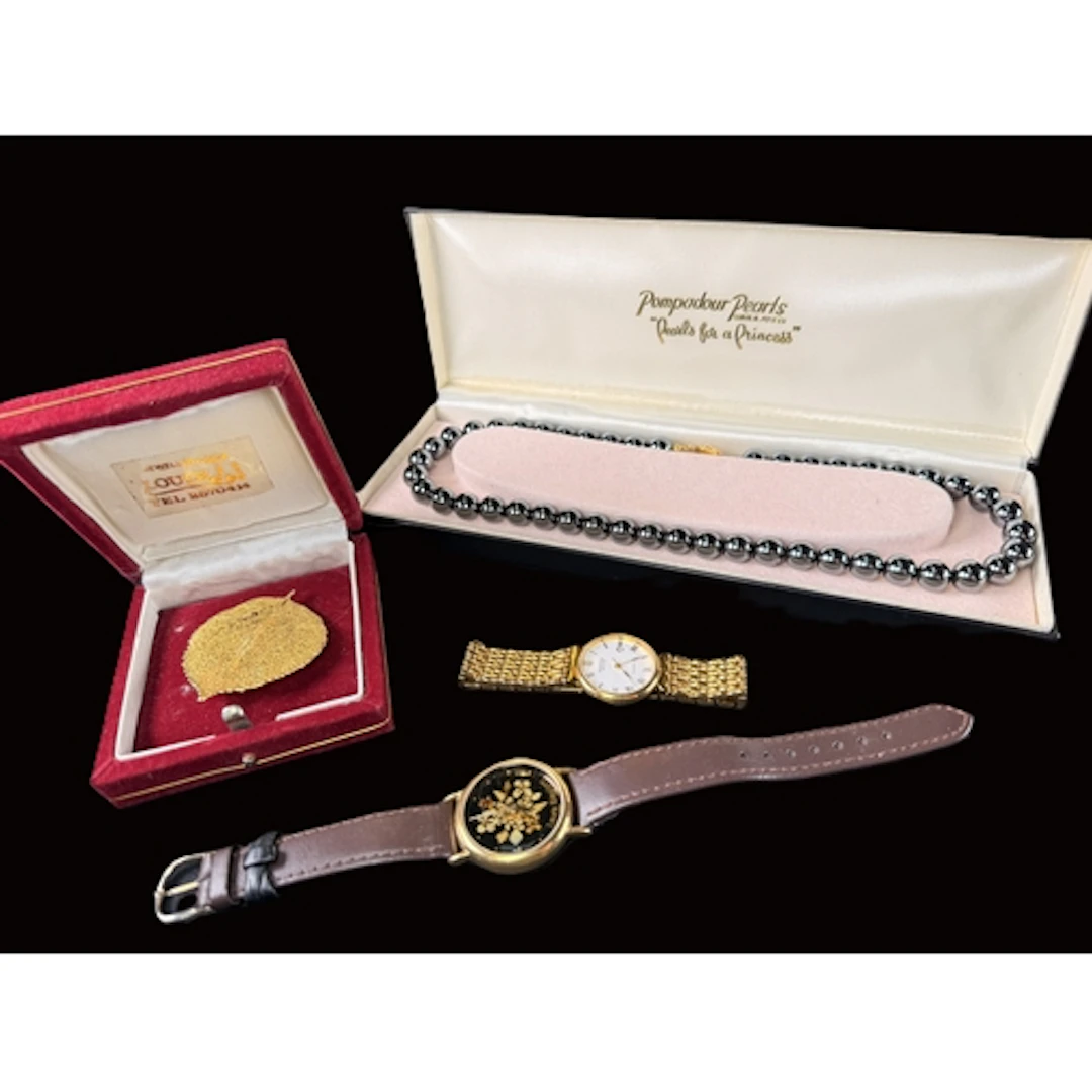 A Laura Bigiotti designer wristwatch, black with floral patt...