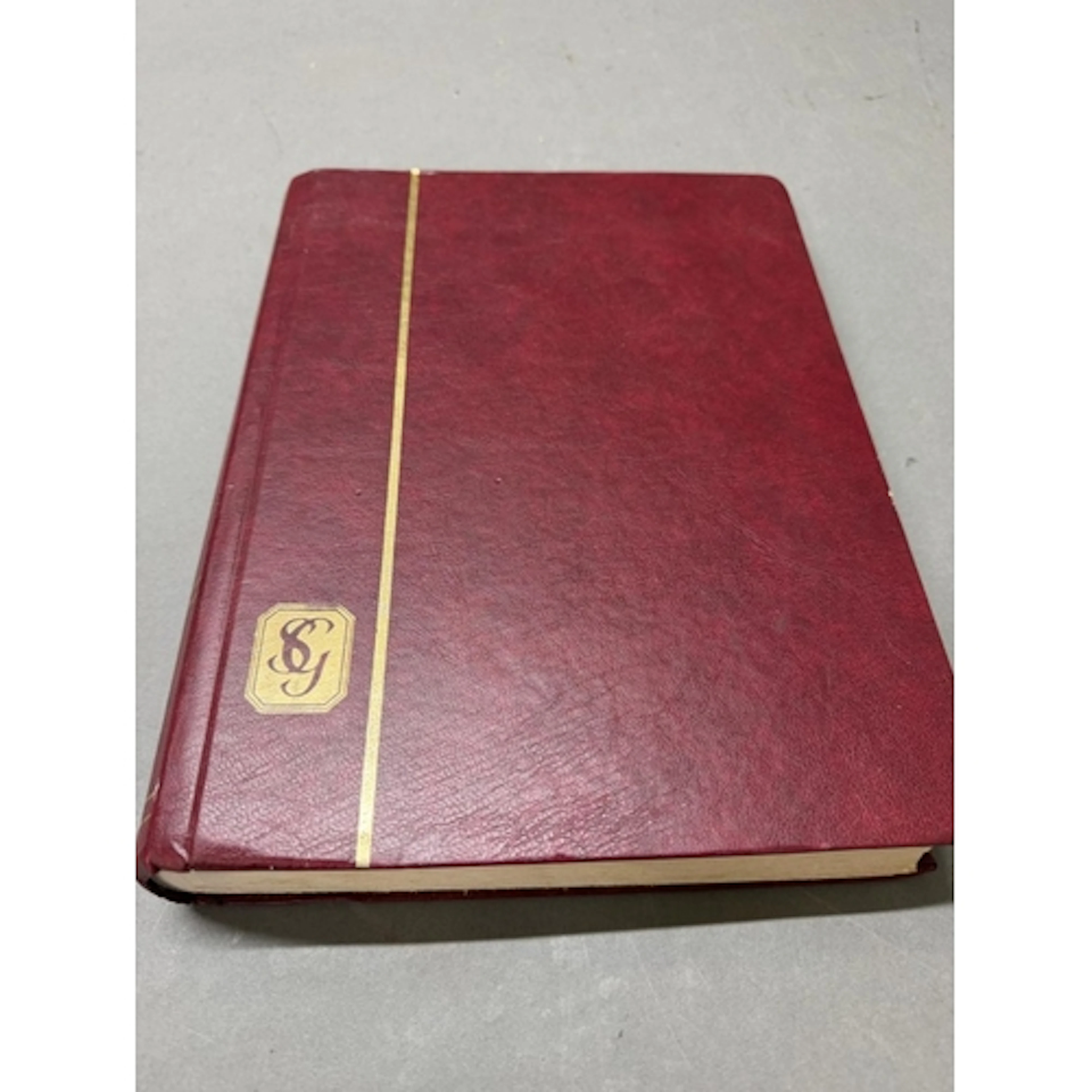 A Partial World stamp album including many from WWII includi...