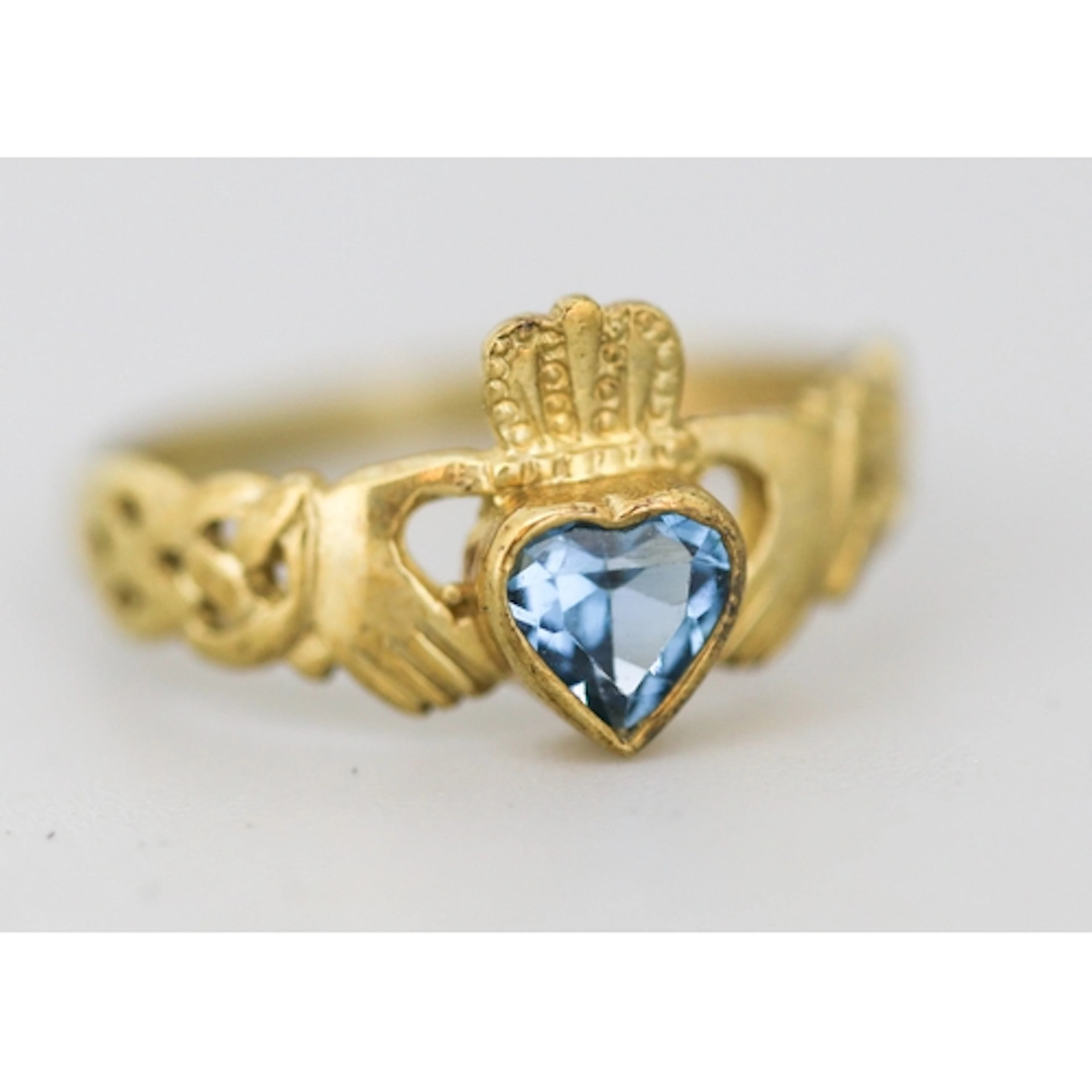 Blue Topaz Set Claddagh Ring, Mounted in 9 Carat Yellow Gold...