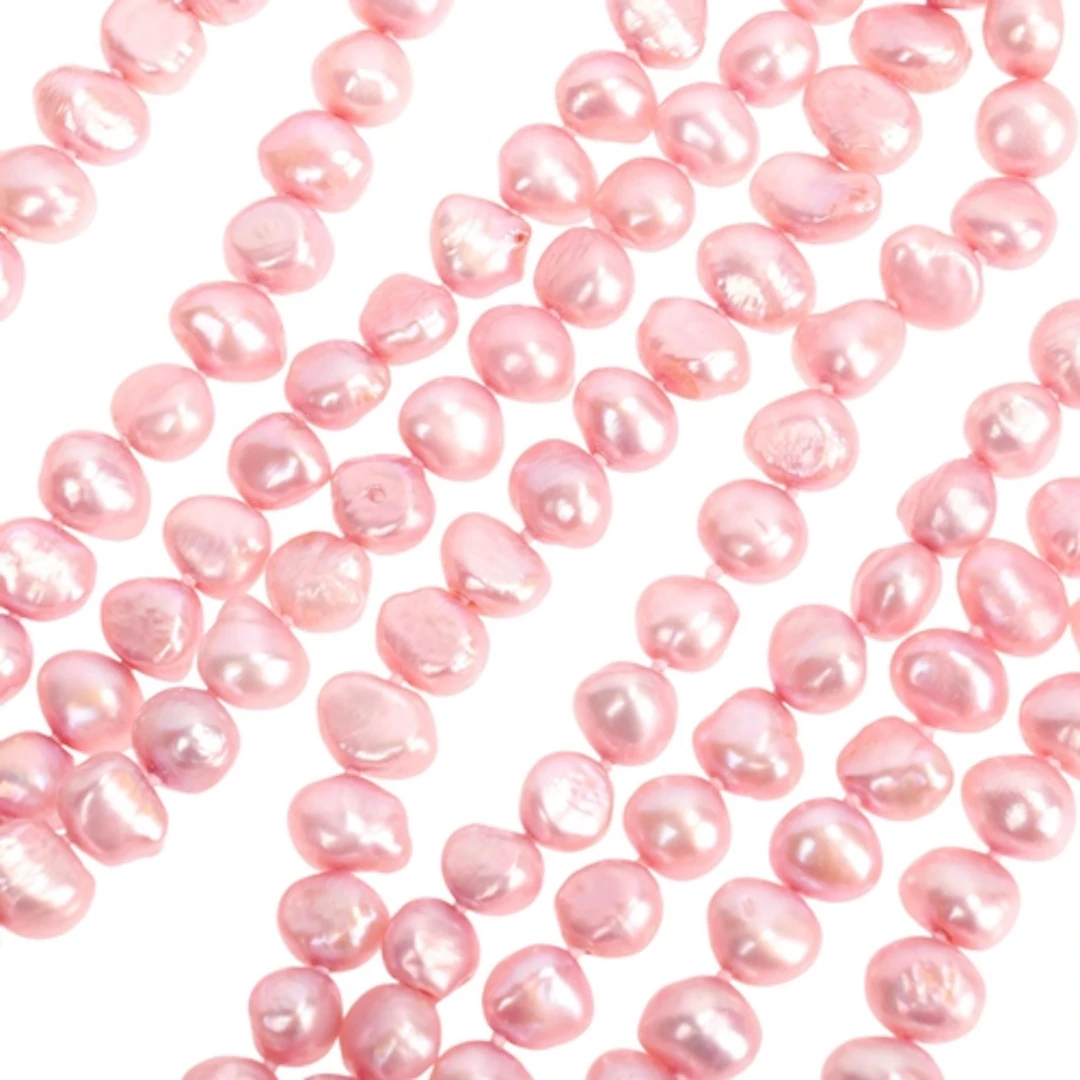A long single-strand pink freshwater pearl bead necklace, pe...