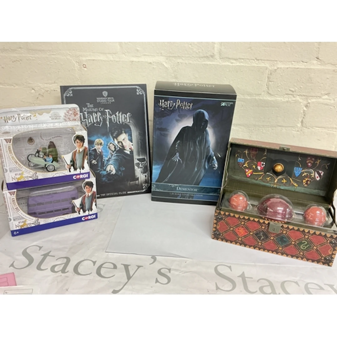 A Collection Of Harry Potter Toys Including Corgi And Magica...