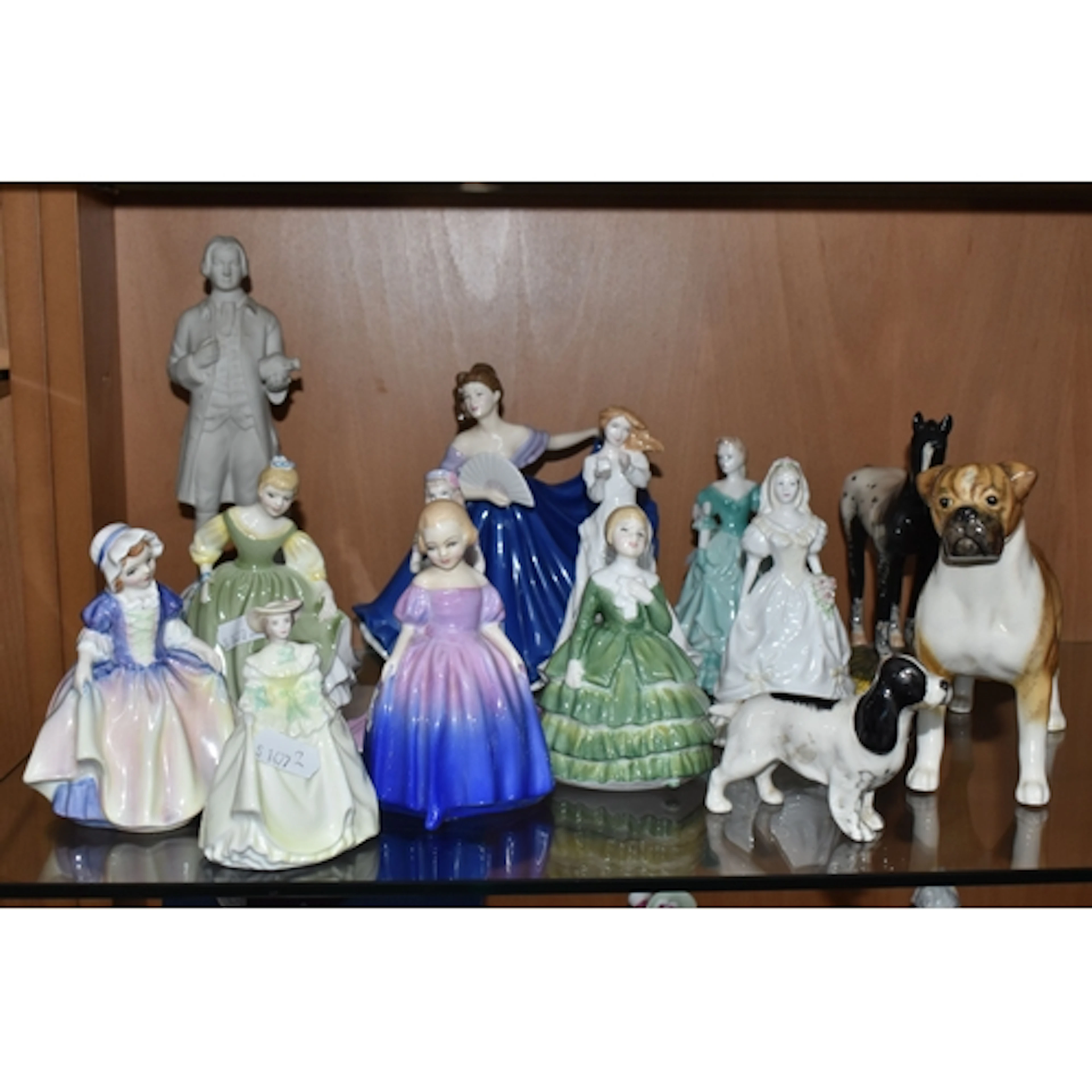 FOURTEEN CERAMIC FIGURES, comprising a Wedgwood figure of Jo...