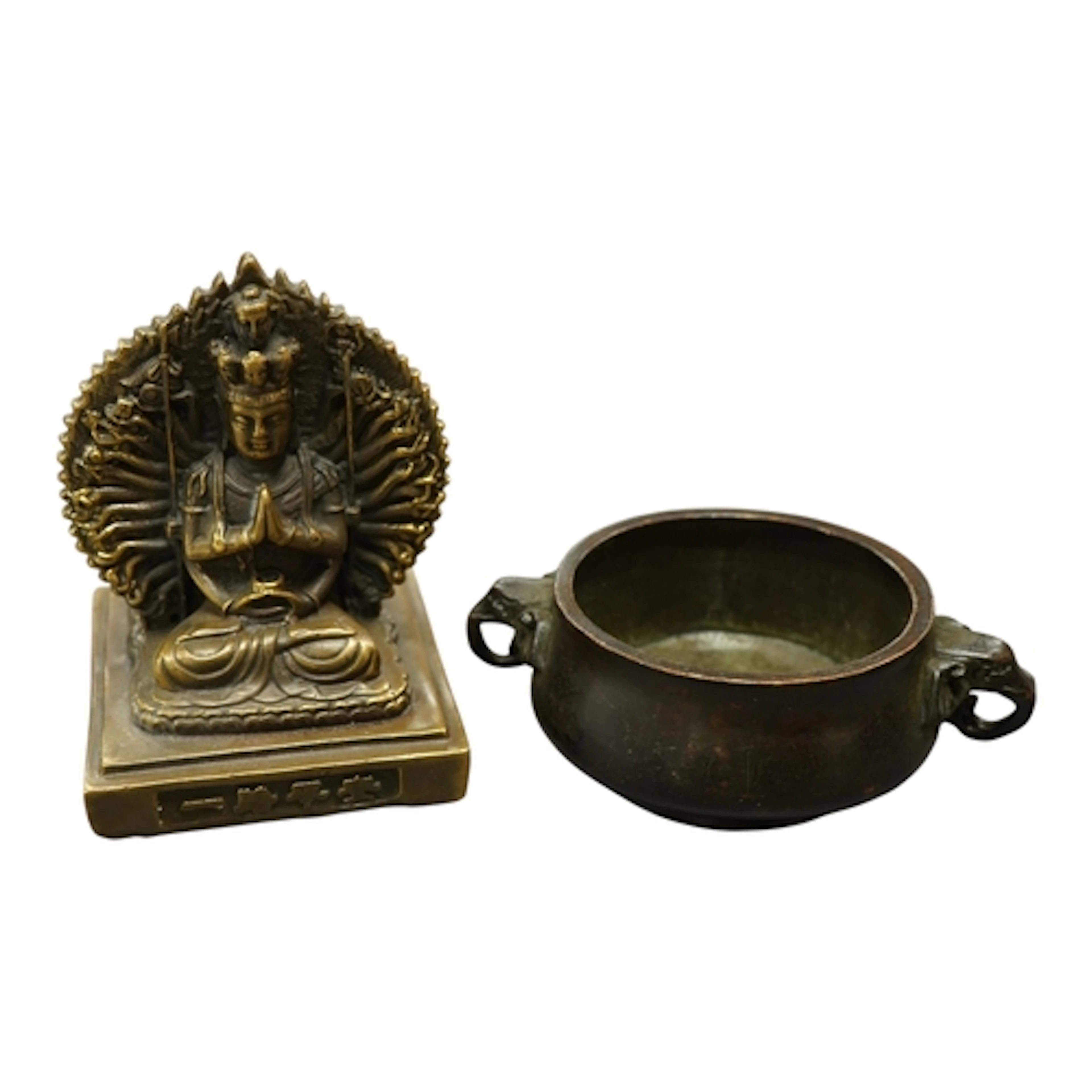 A Chinese small bronze figure of multi-arm Buddha and a bron...