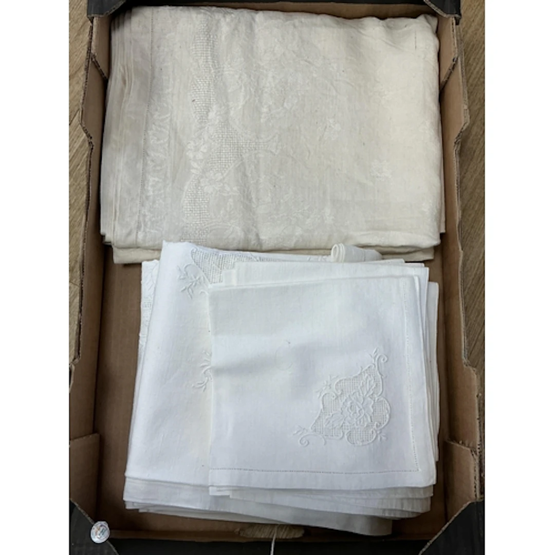 A quantity of embroidered table linen