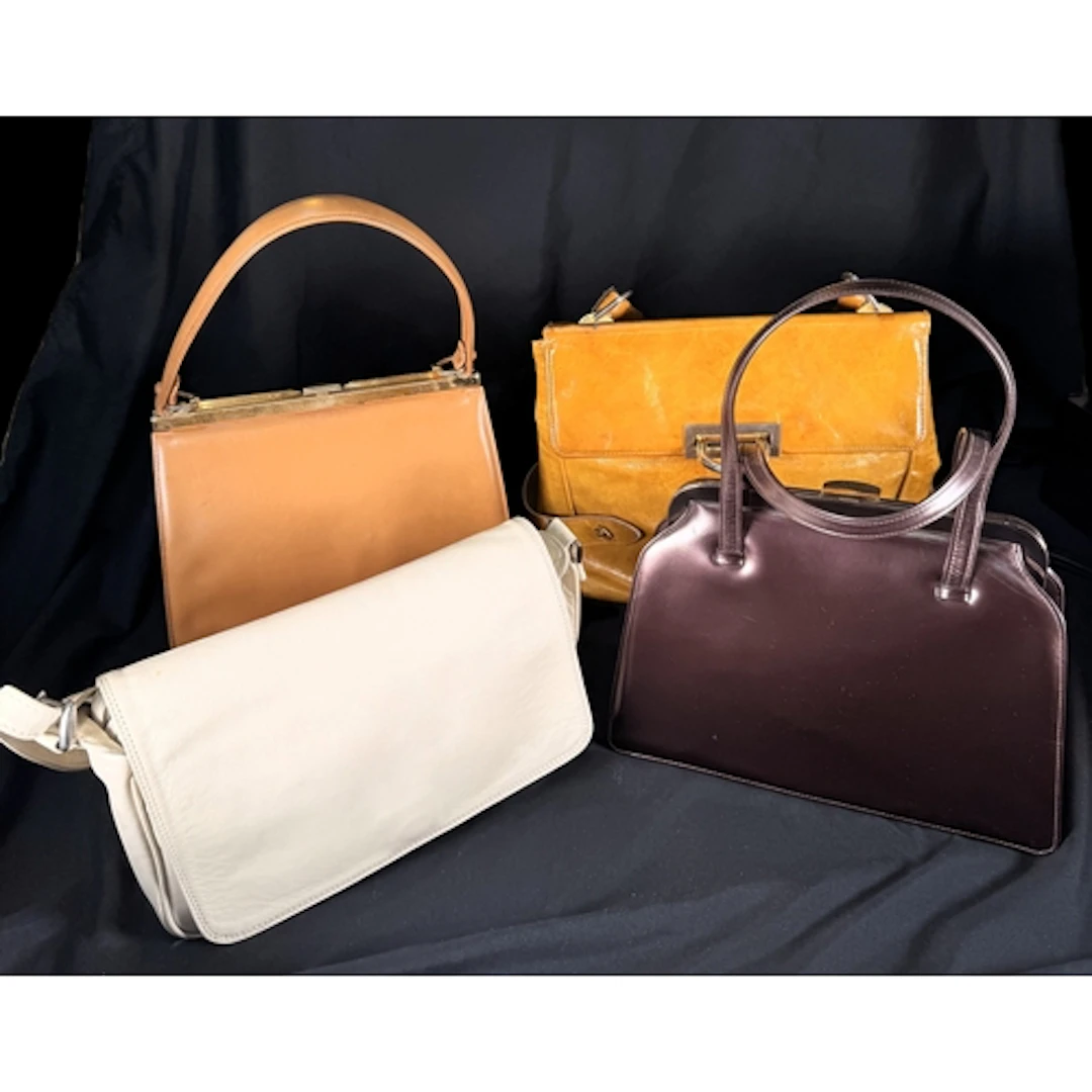 A mid 20th century LODIX classic pearlescent brown leather h...