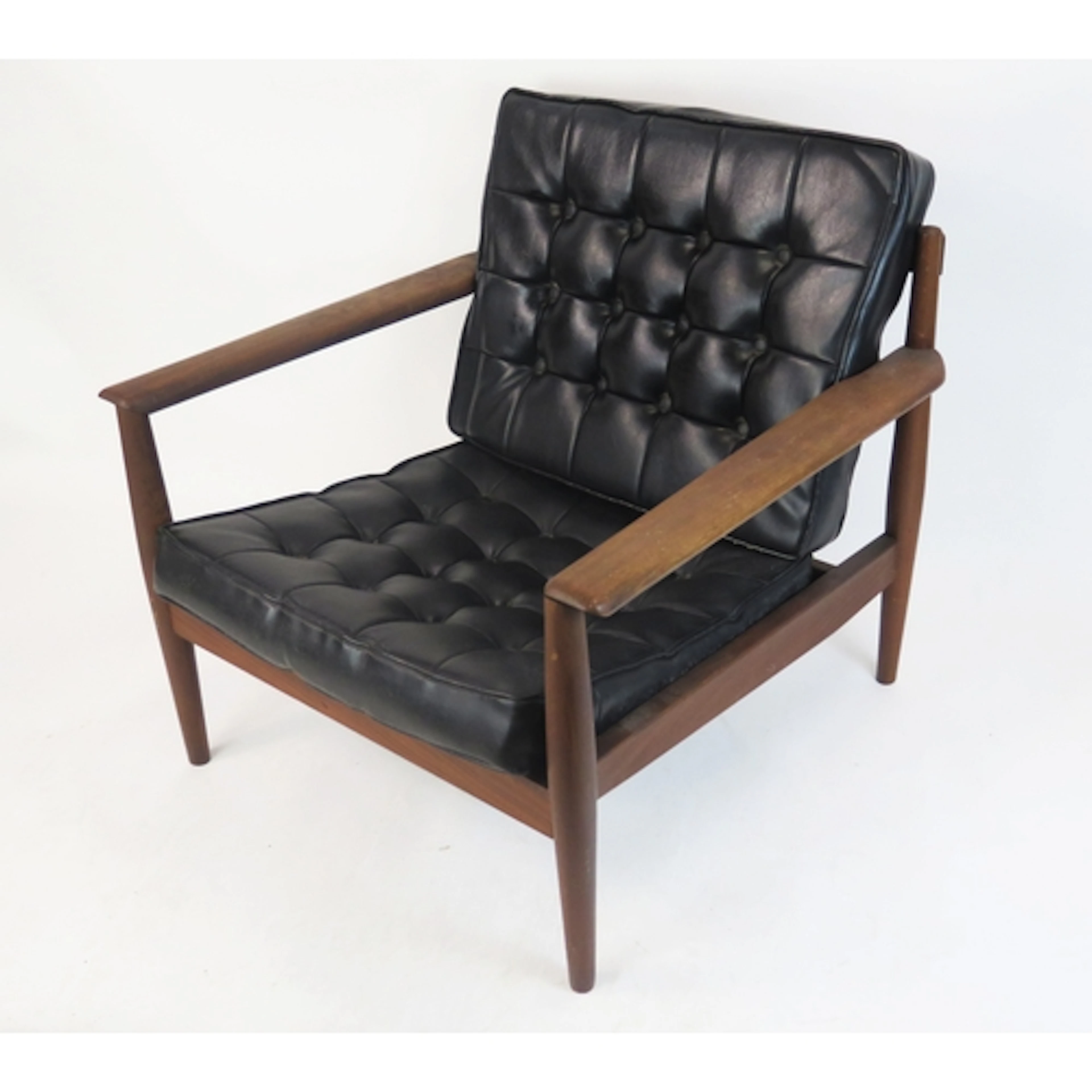 Mid century teak armchair with black leather button back sea...