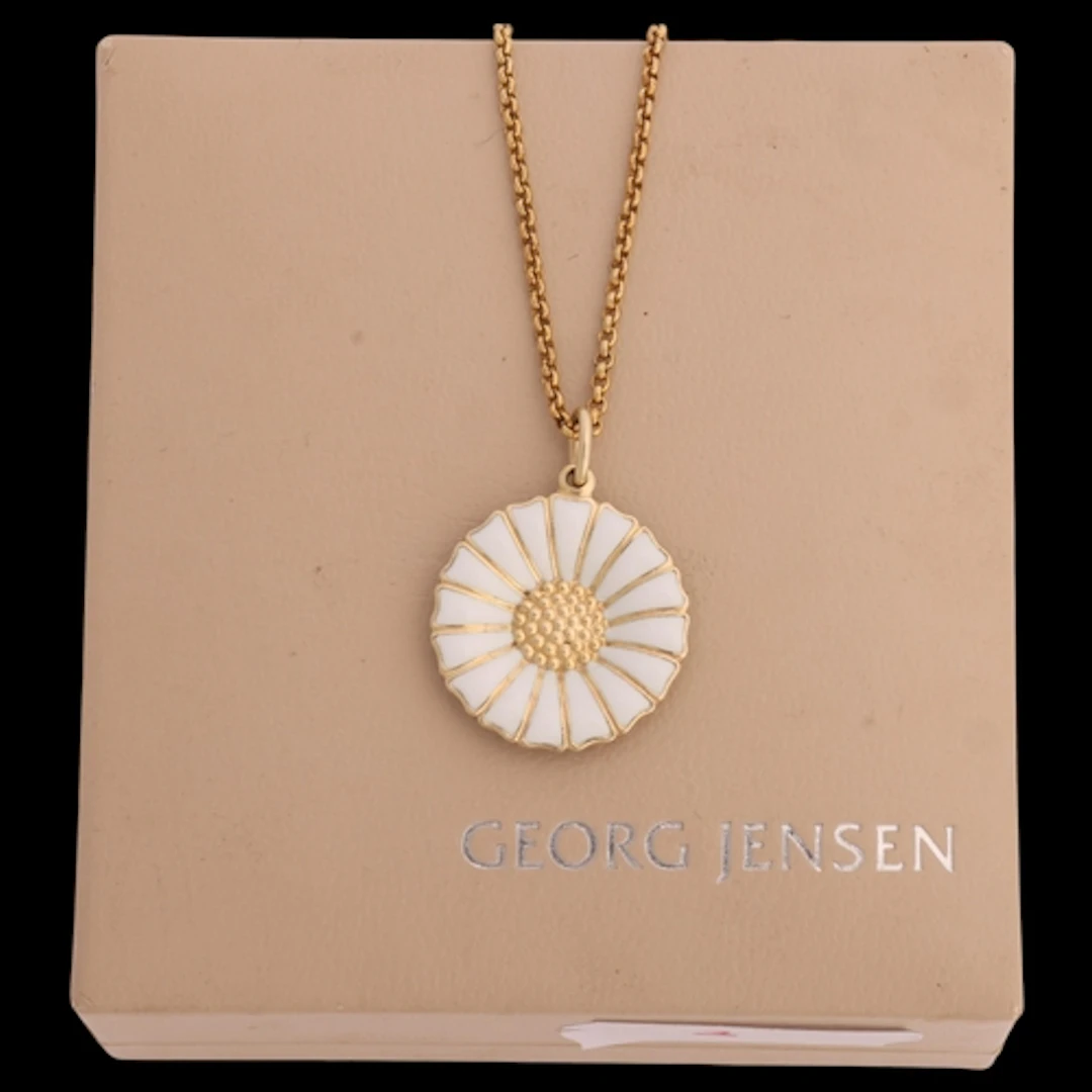 GEORG JENSEN - a Danish modernist sterling silver-gilt white...