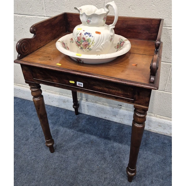 A 19TH CENTURY MAHOGANY WASH STAND, with raised back and sid...