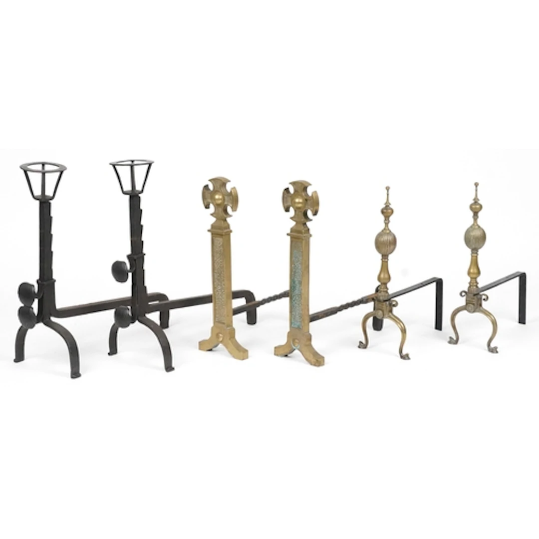 Three pairs of cast iron fire dogs, the largest 60cm high.