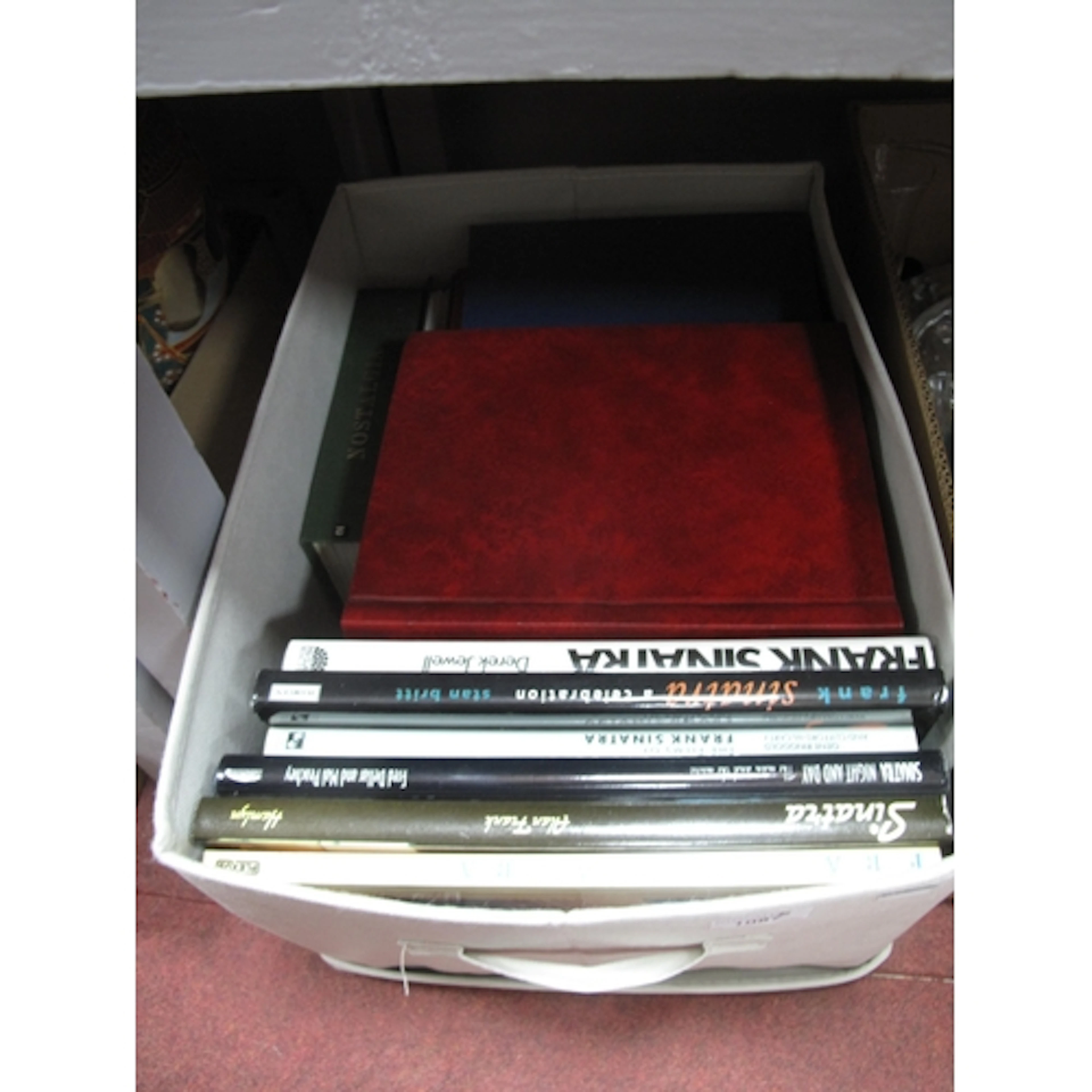 Mixed Lot of Frank Sinatra books and VHS tapes, along with 1...