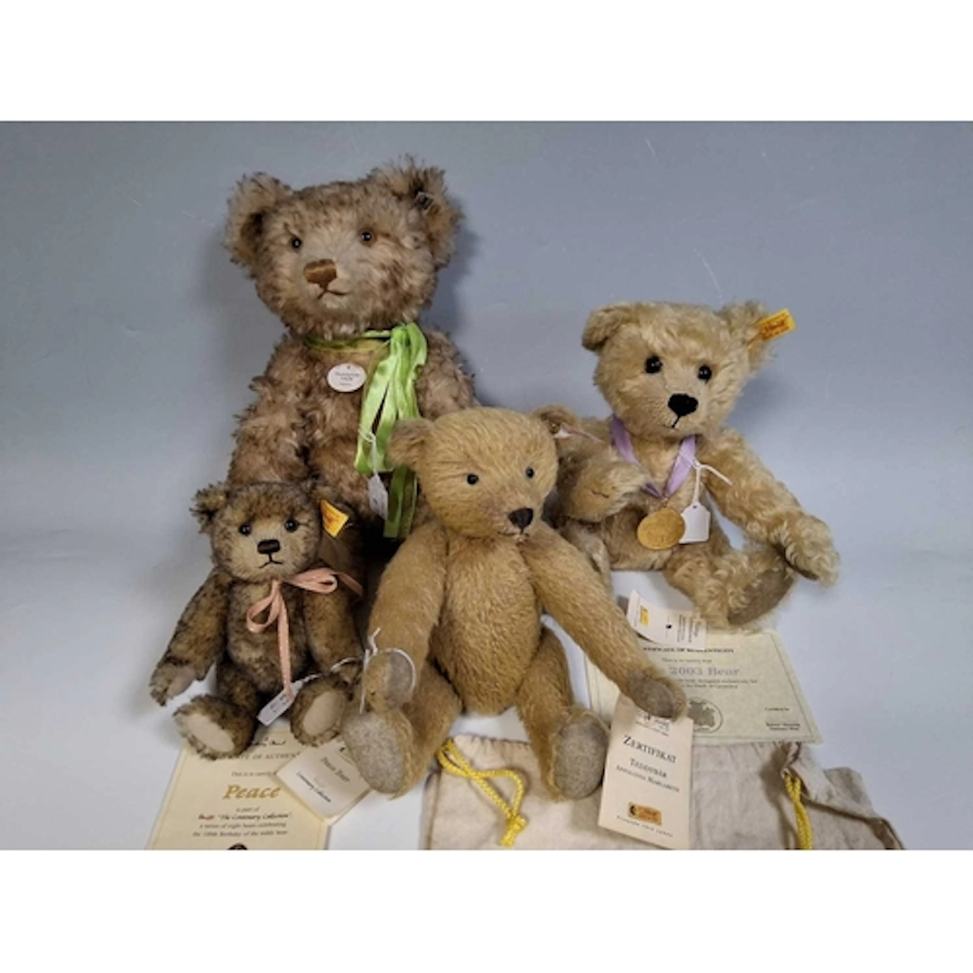 FOUR STEIFF LIMITED EDITION MOHAIR TEDDY BEARS comprising a ...