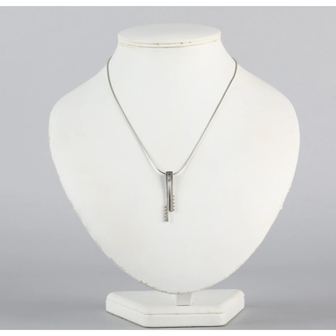 Silver pendant and chain.