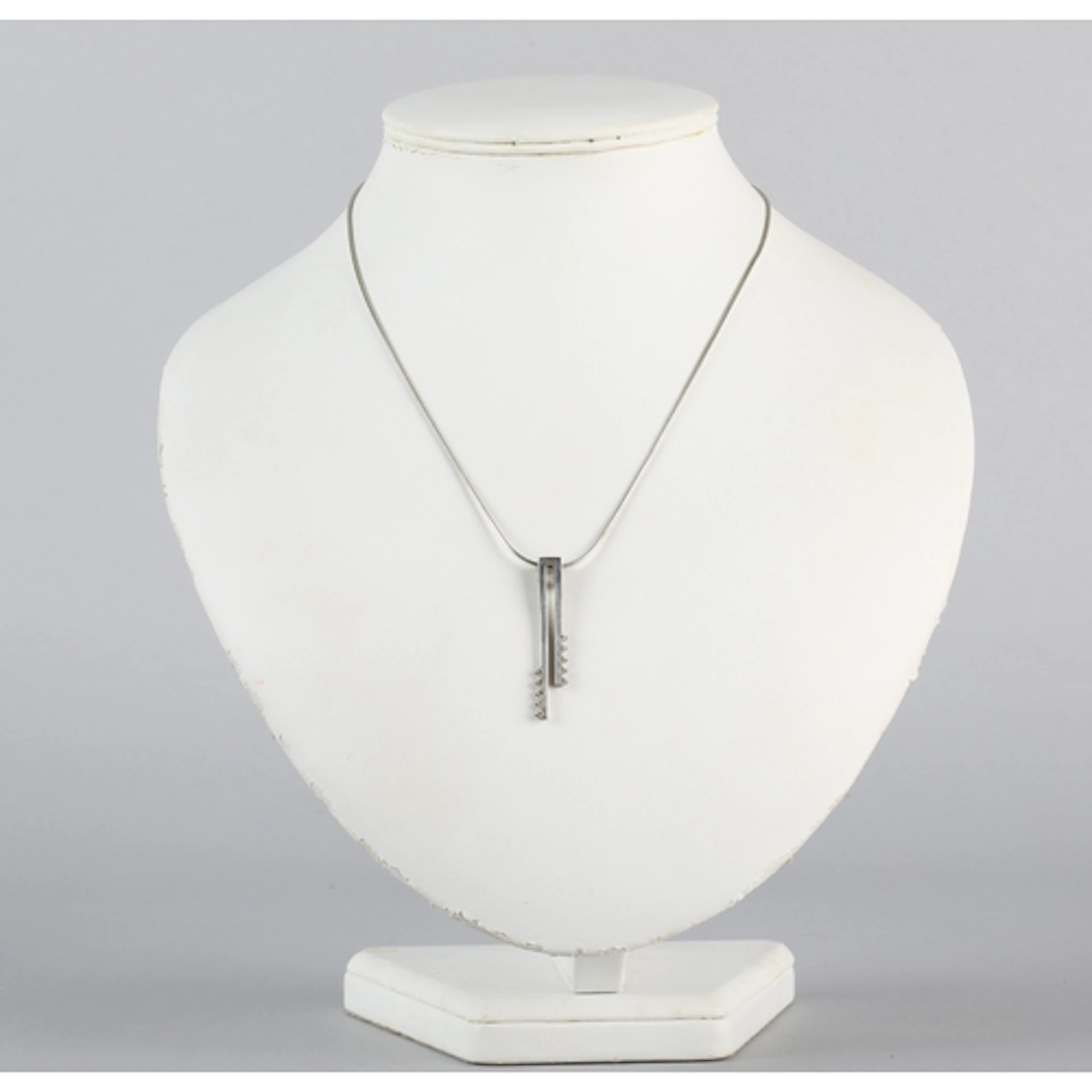 Silver pendant and chain.