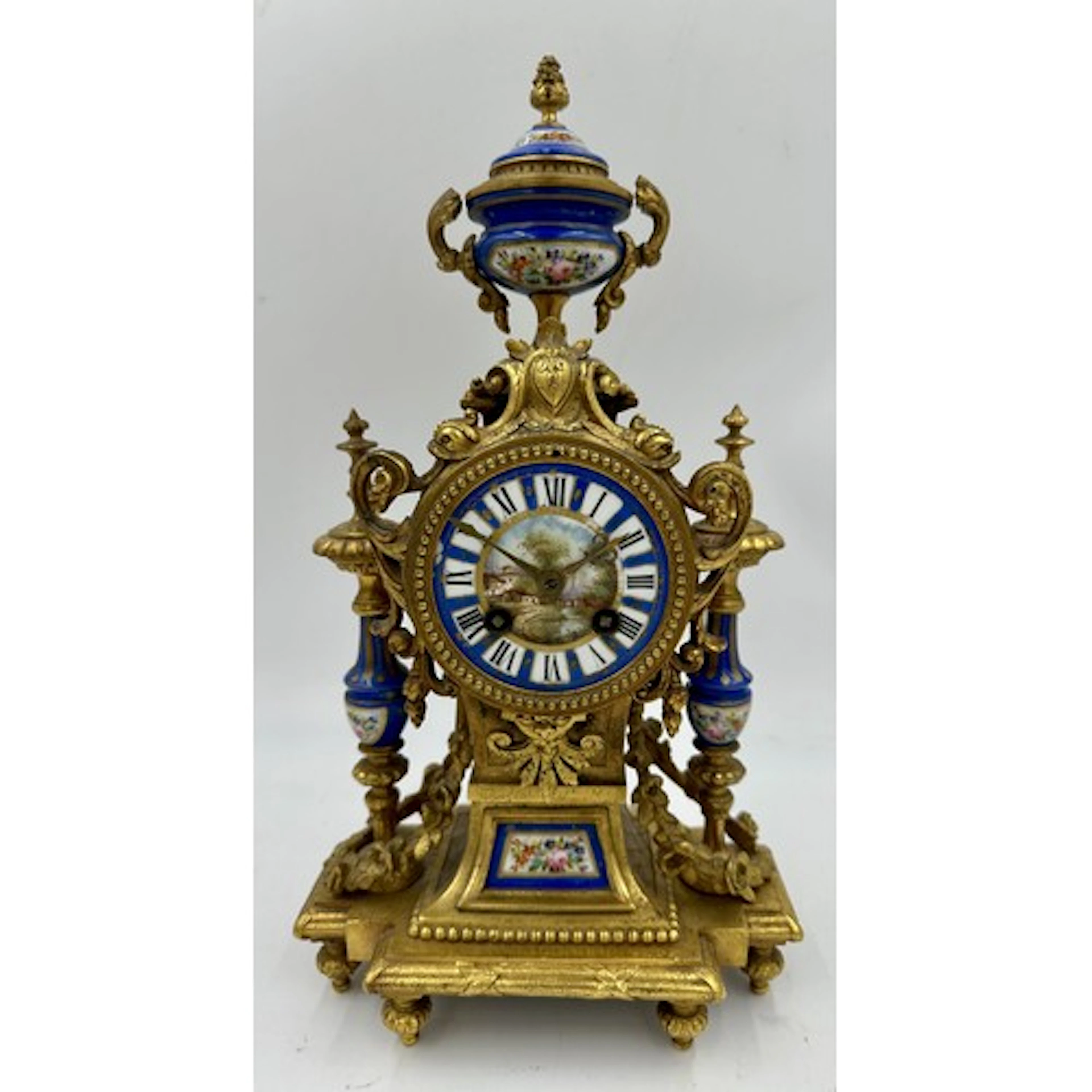A late 19thC French Sèvres style gilt mantel clock with cent...