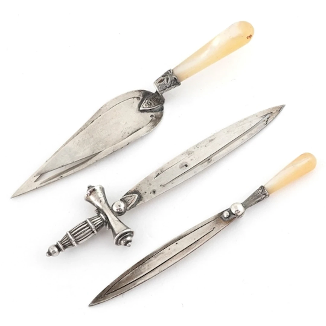 Three Victorian silver bookmarks, two with mother of pearl h...