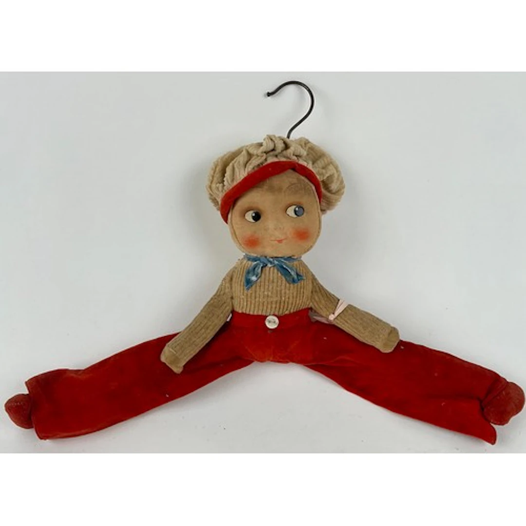 An unusual 1930’s child’s coat hanger, in the manner of Nora...