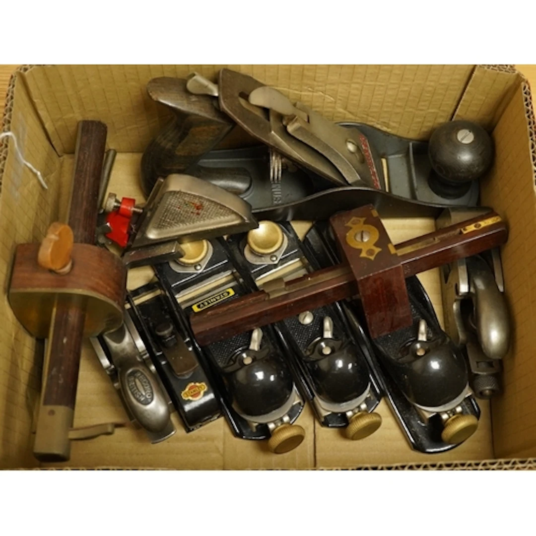 Nine small wood working planes, including; a Stanley Handyma...