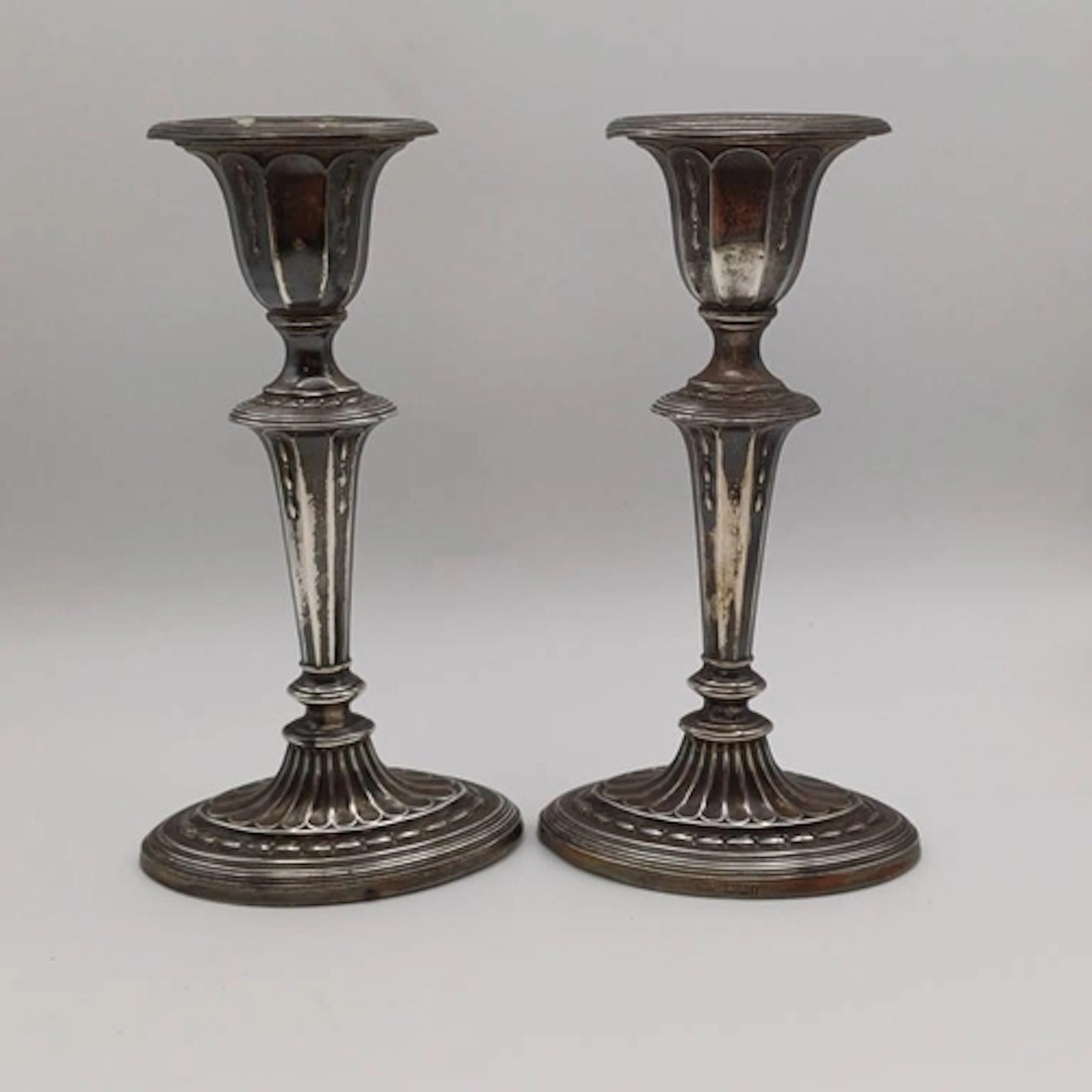 A PAIR OF SILVER CANDLESTICKS BY JAMES DIXON & SONS, SHEFFIE...