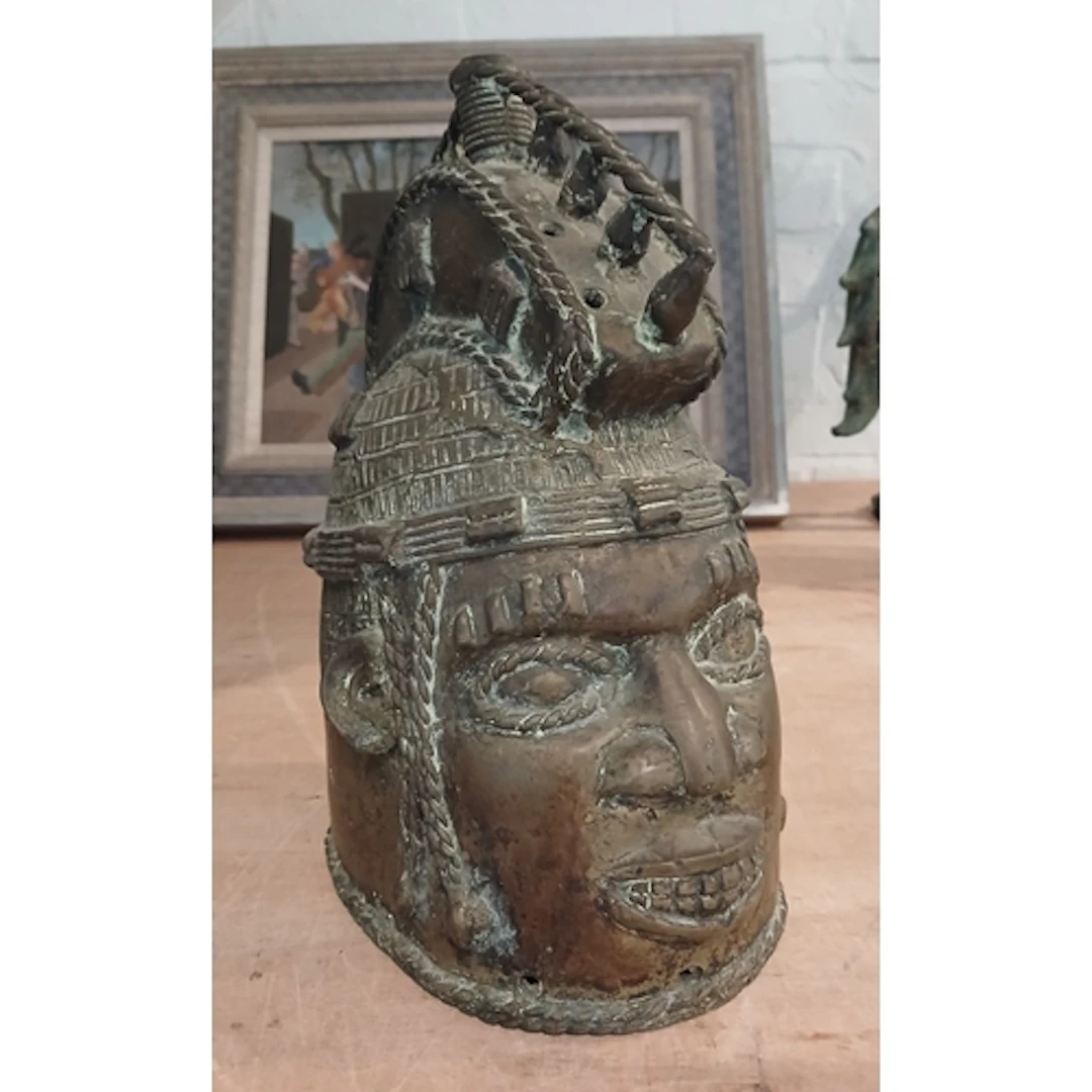 A Benin bronze Oduduwa mask, Nigeria, probably 19th century,...