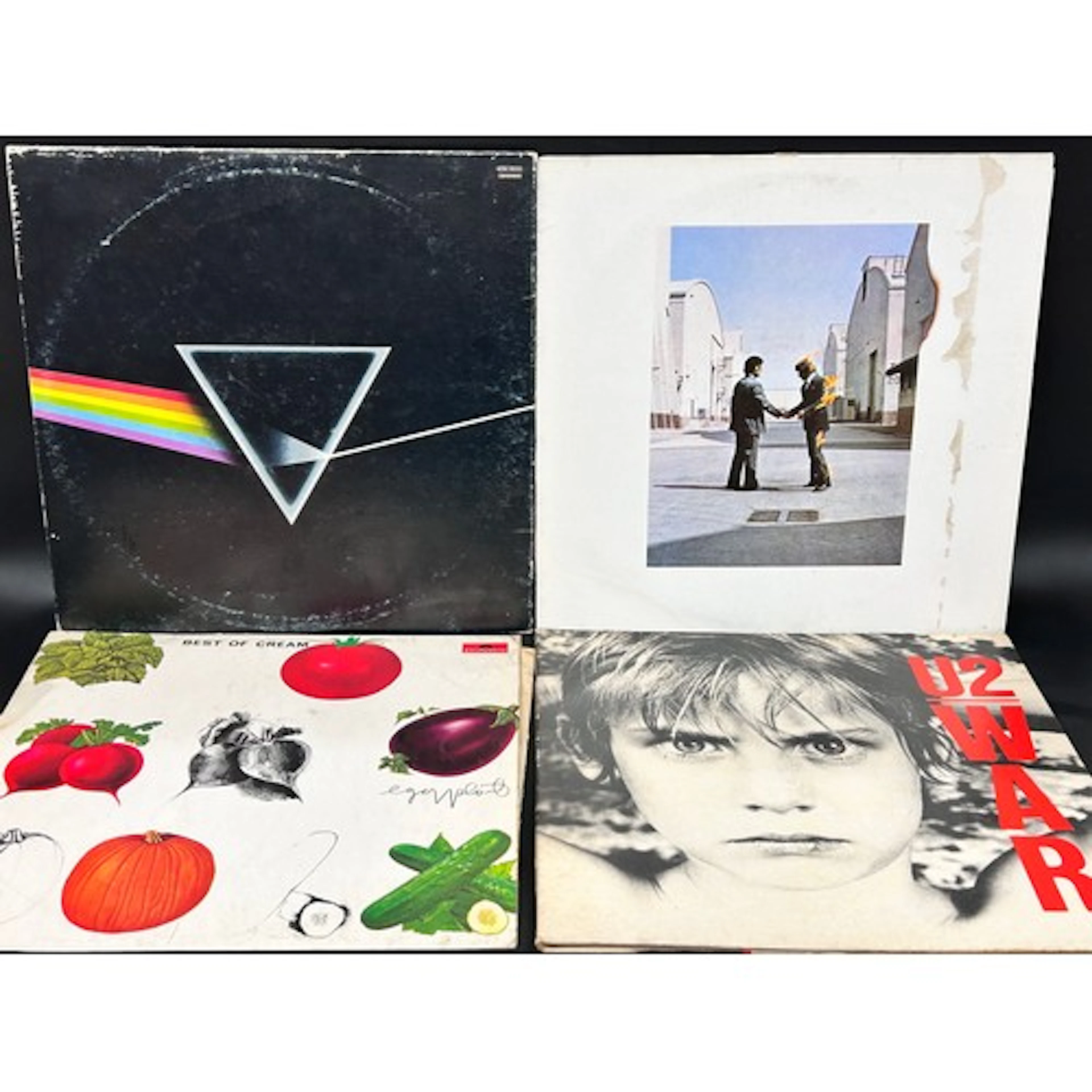 A collection of vinyl LP records including Fleetwood Mac, Pi...