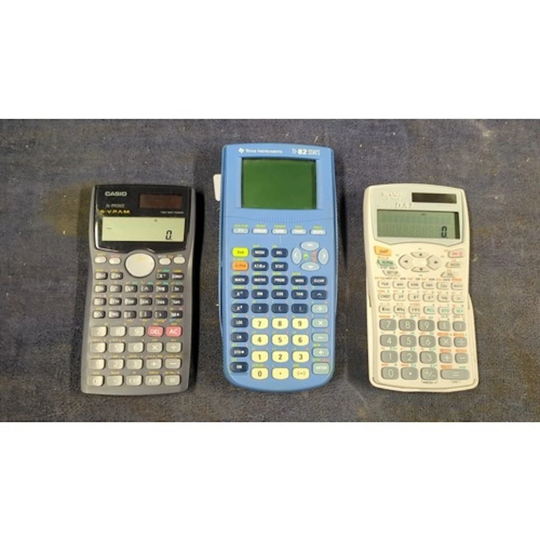 Three calculators: a Texas Instruments TI-82 STATS graphing ...