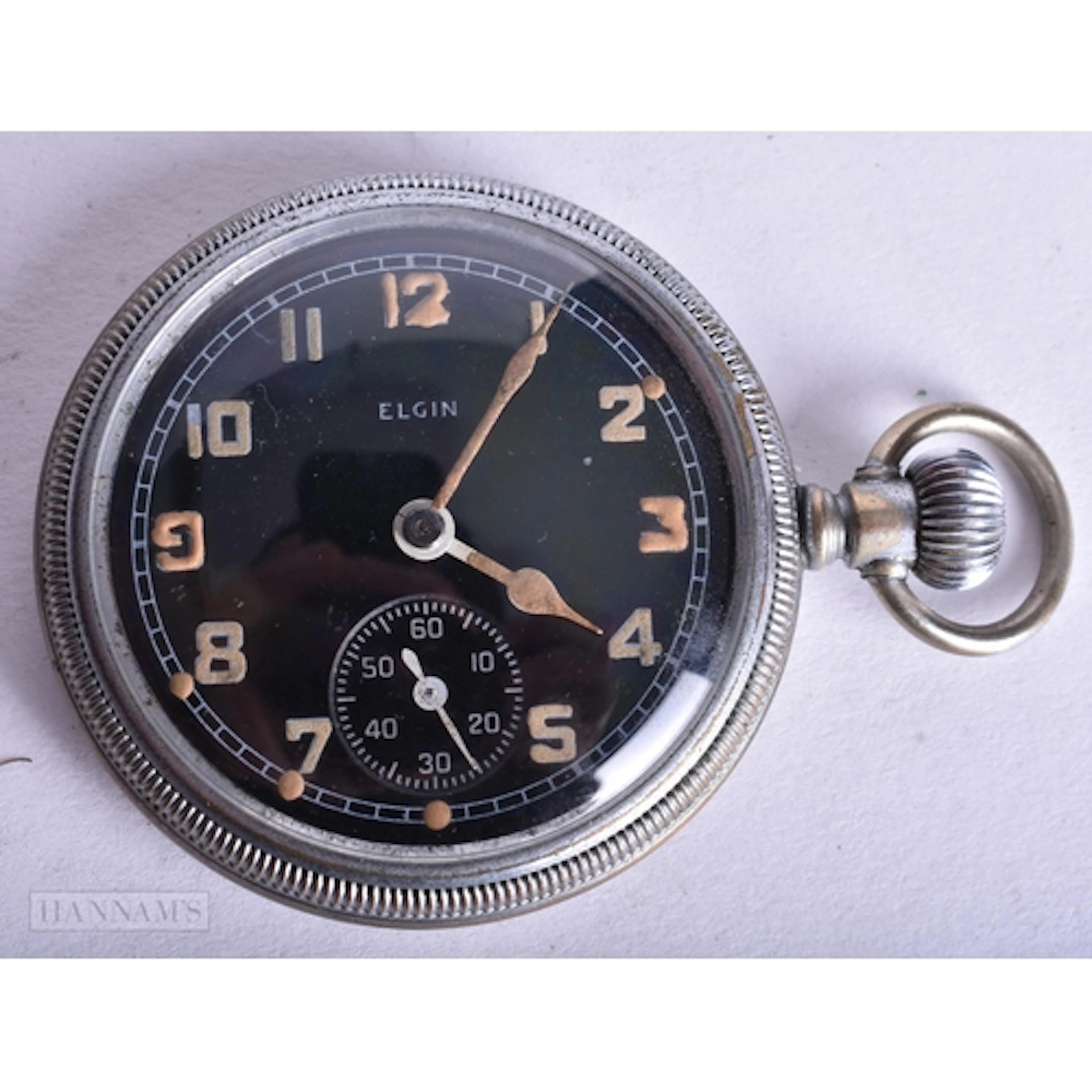 AN ELGIN GSTP MILITARY POCKET WATCH. Running. 5 cm wide.
