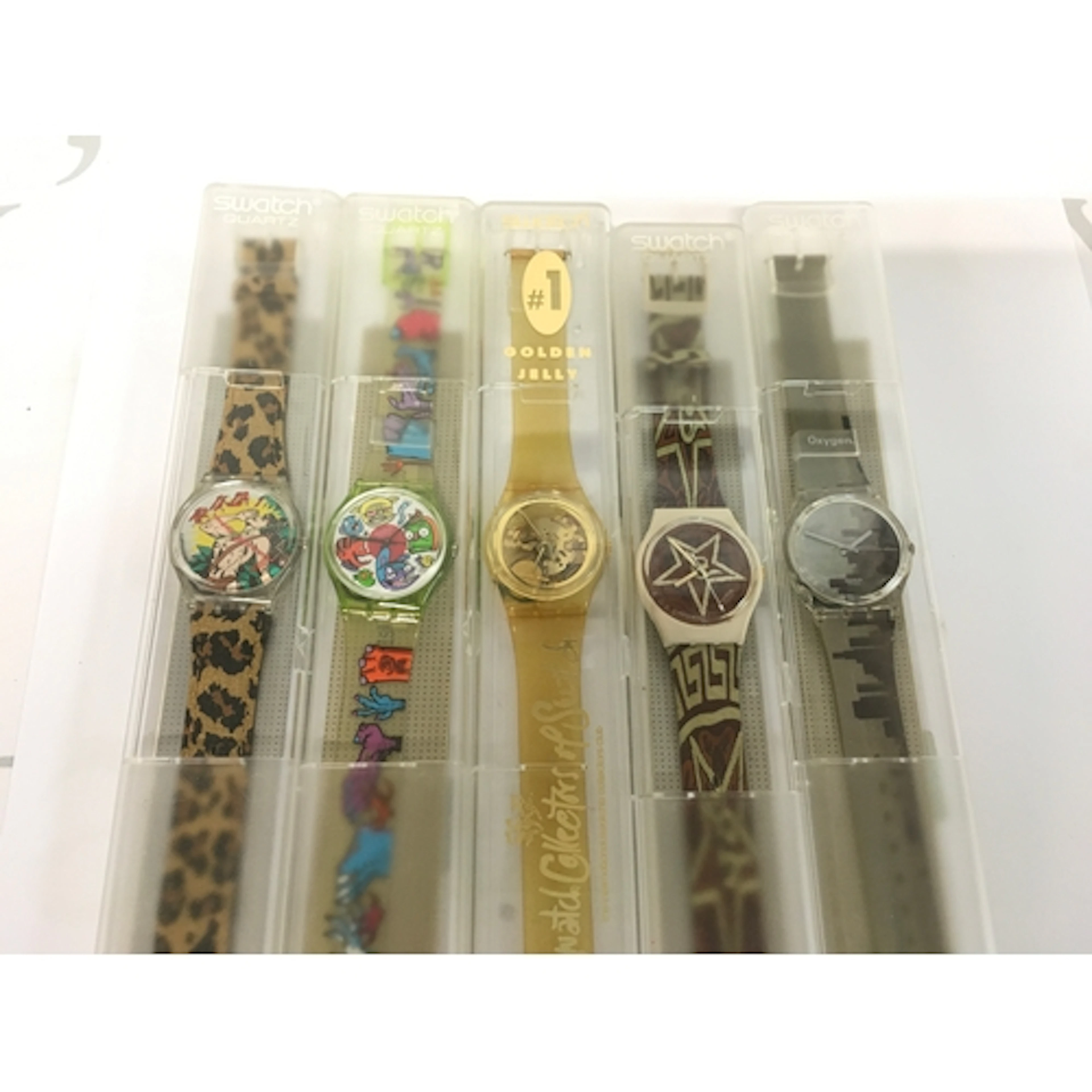 collection of five vintage Swatch watches from the 1990s inc...