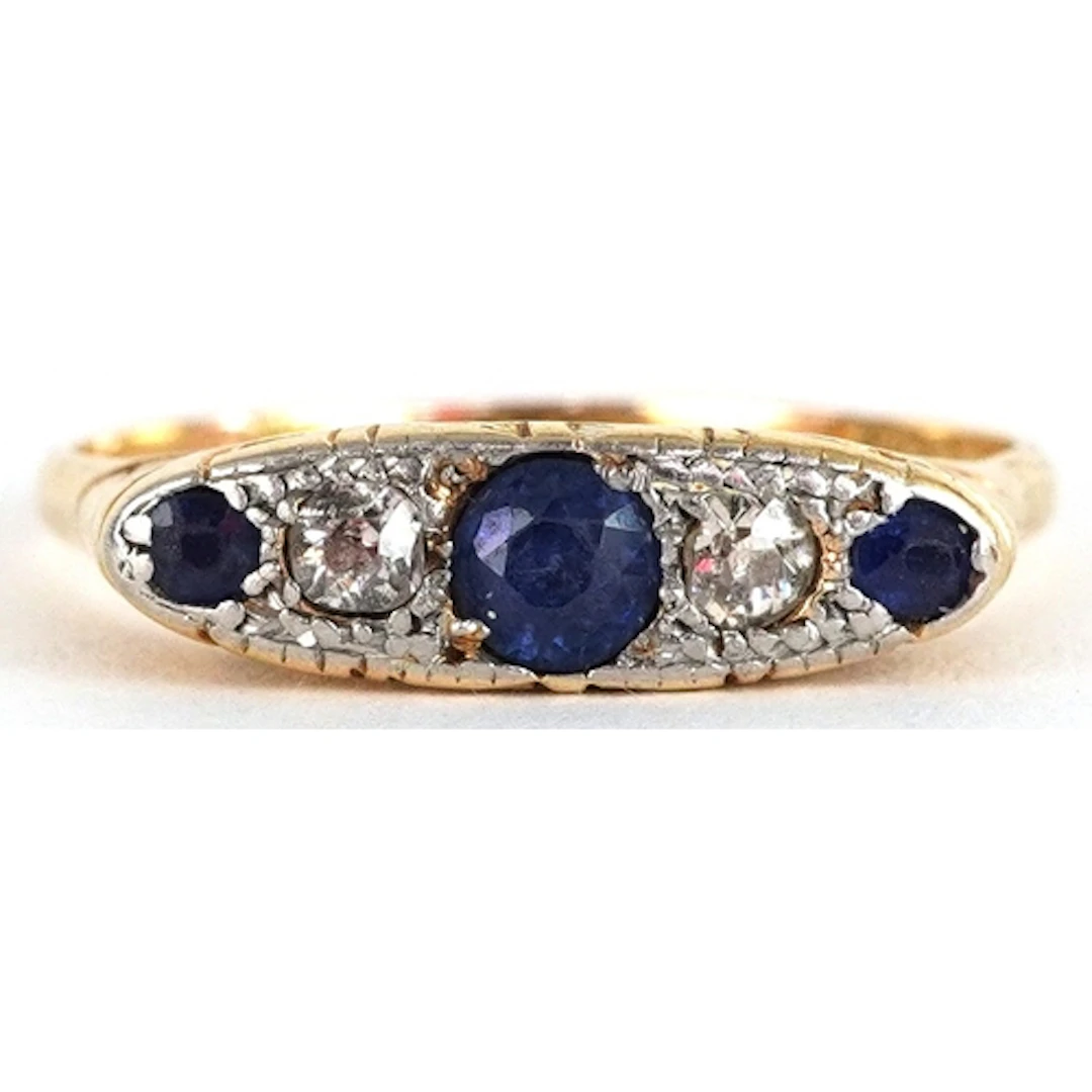 18ct gold and platinum sapphire and diamond graduated five s...