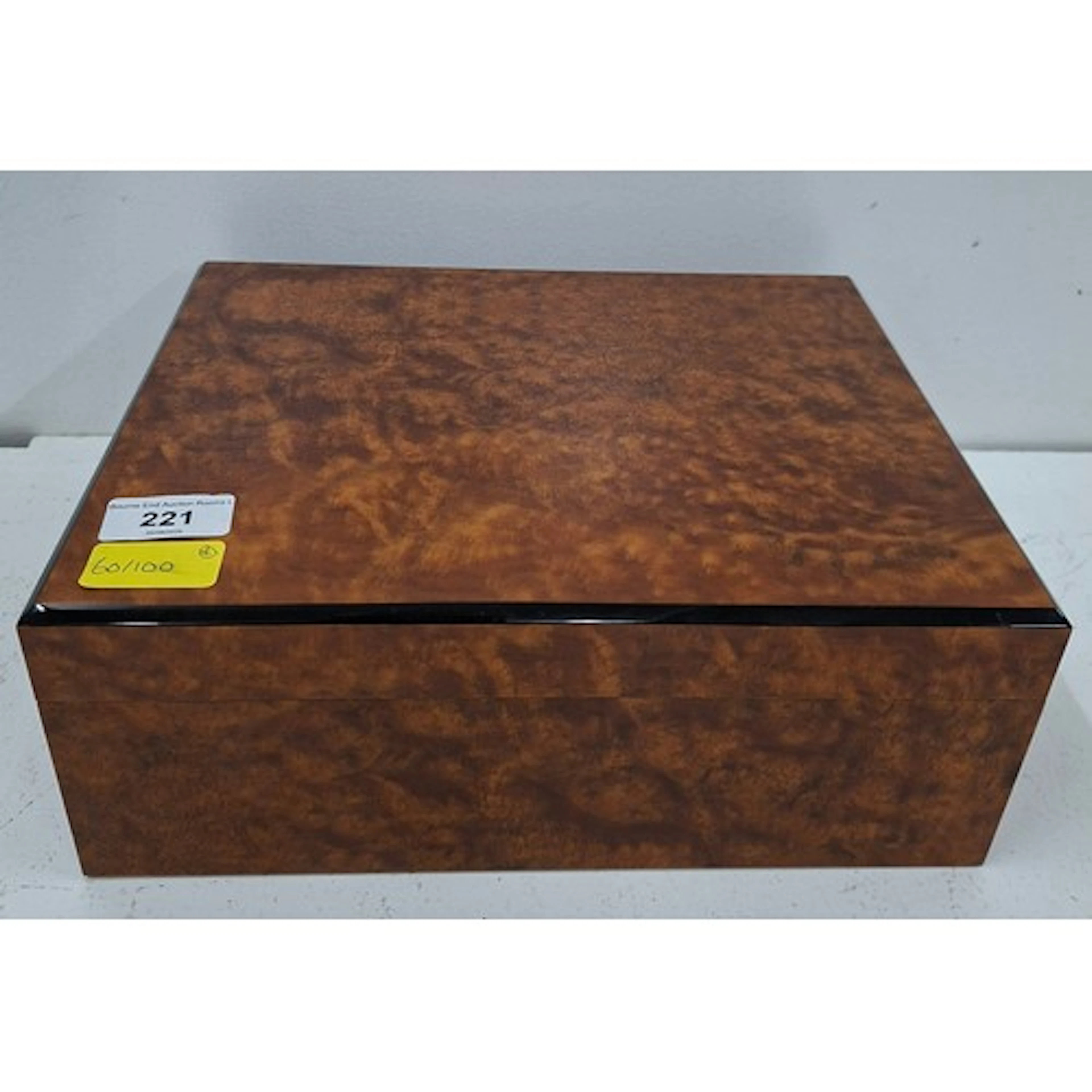 A walnut and cedar lined humidor approx 31cm wide x 24cm dee...