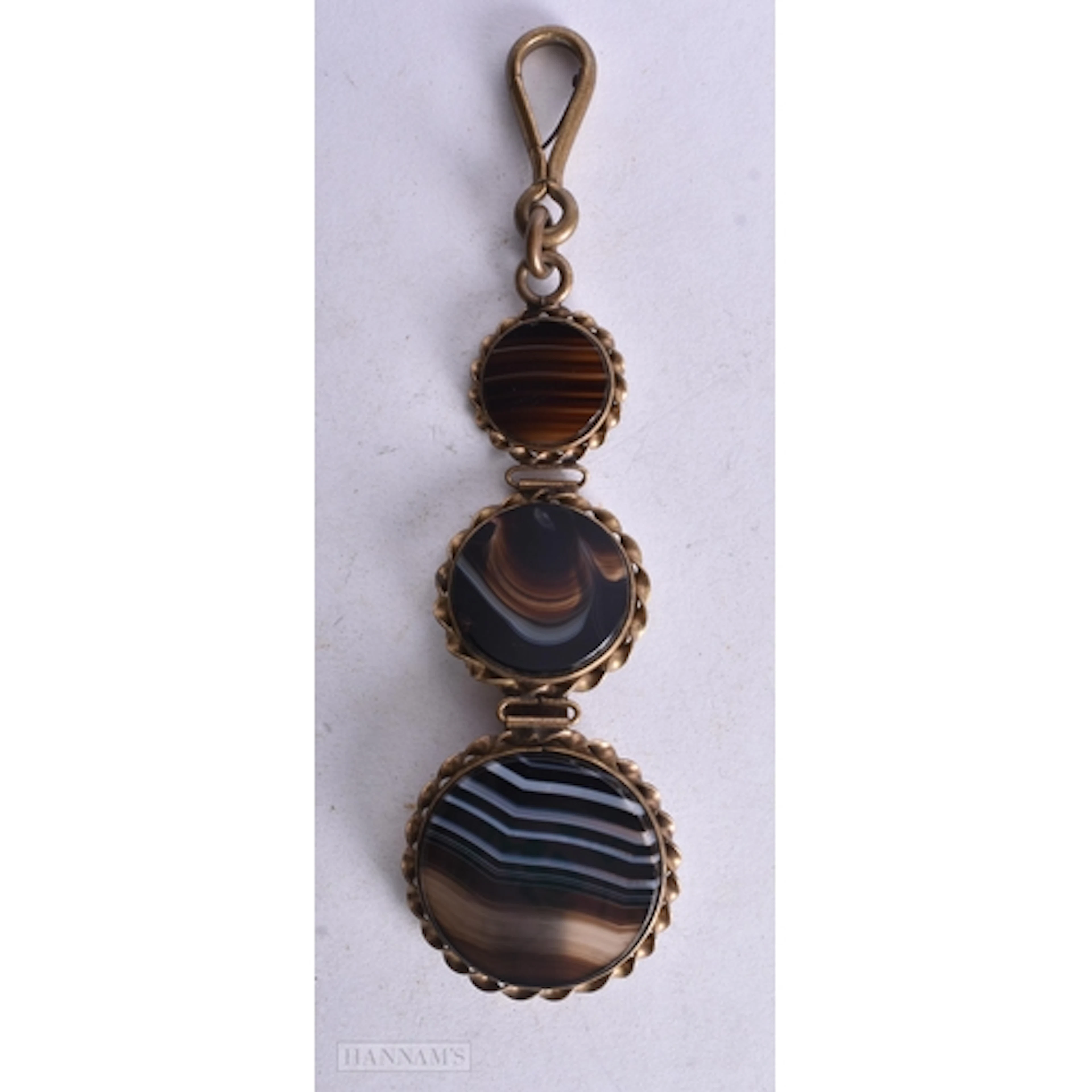 AN UNUSUAL EARLY VICTORIAN BANDED AGATE CHATELAINE CHAIN. 13...