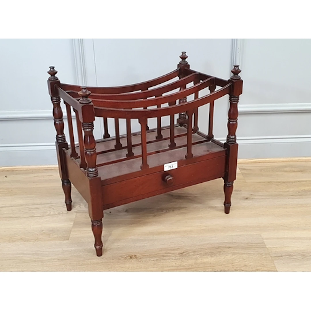 A mahogany Canterbury fitted single drawer raised on turned ...