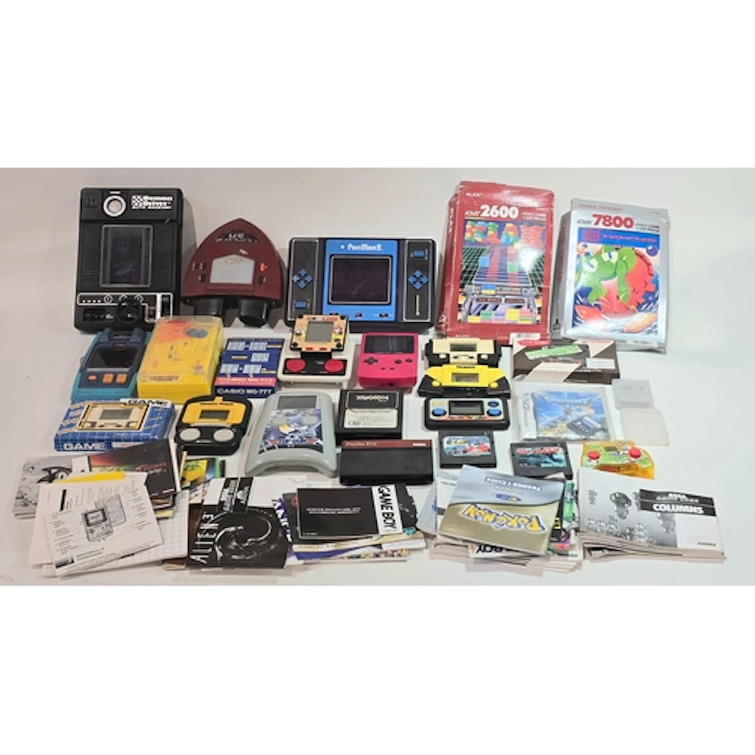 Large collection of mostly vintage handheld electronic games...