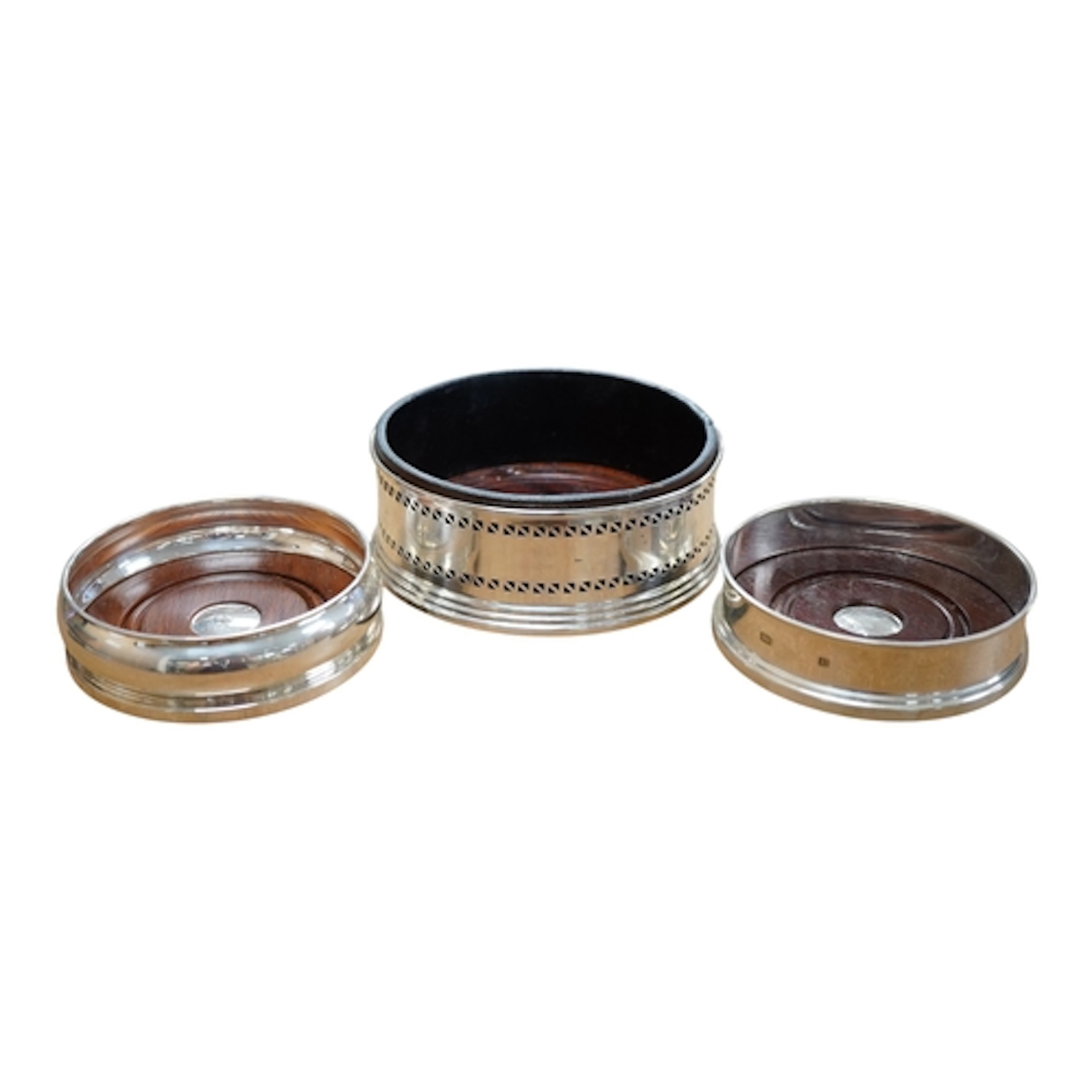 Three modern silver mounted wine coasters, largest by Broadw...