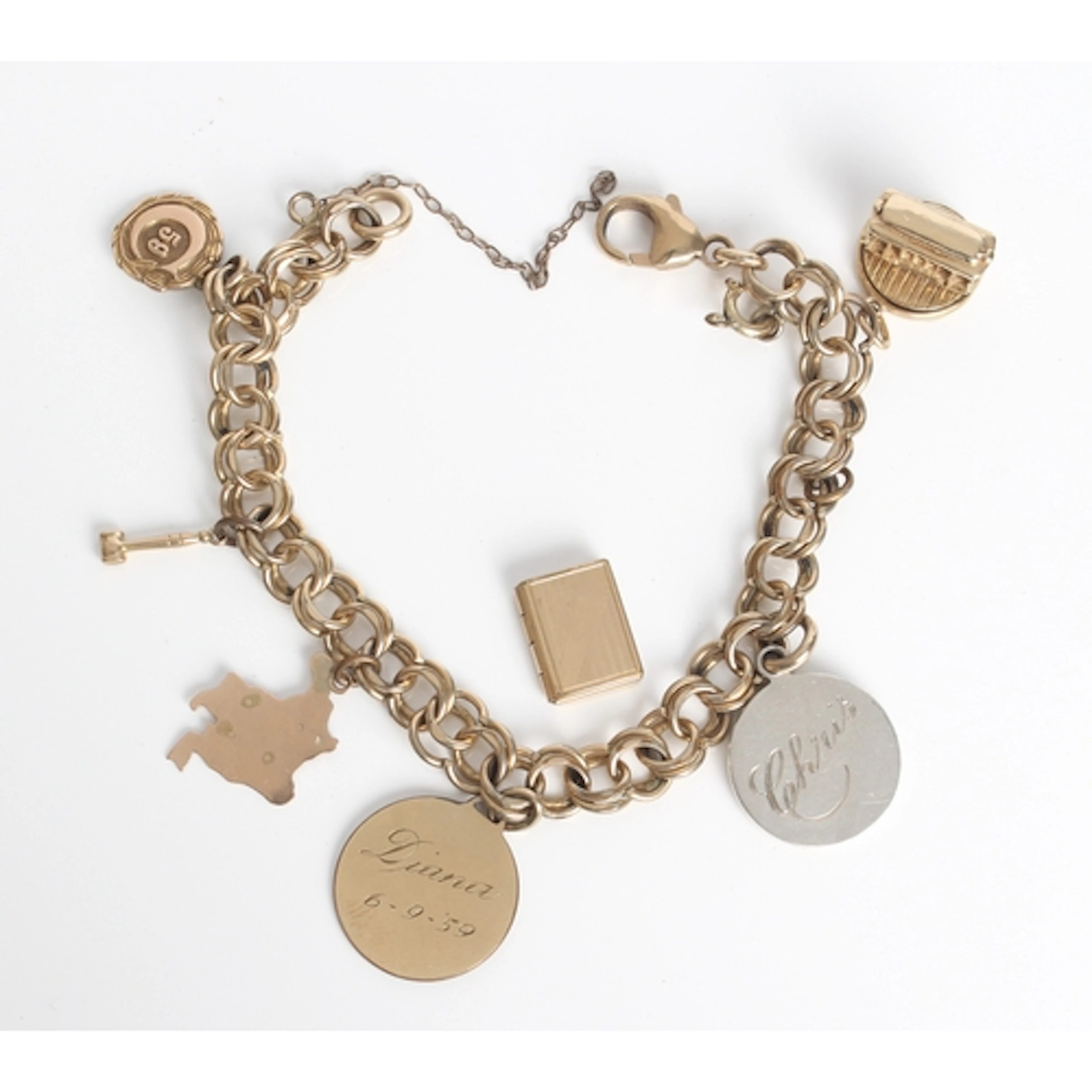 A 1930s-40s rolled gold charm bracelet - rope chain design, ...