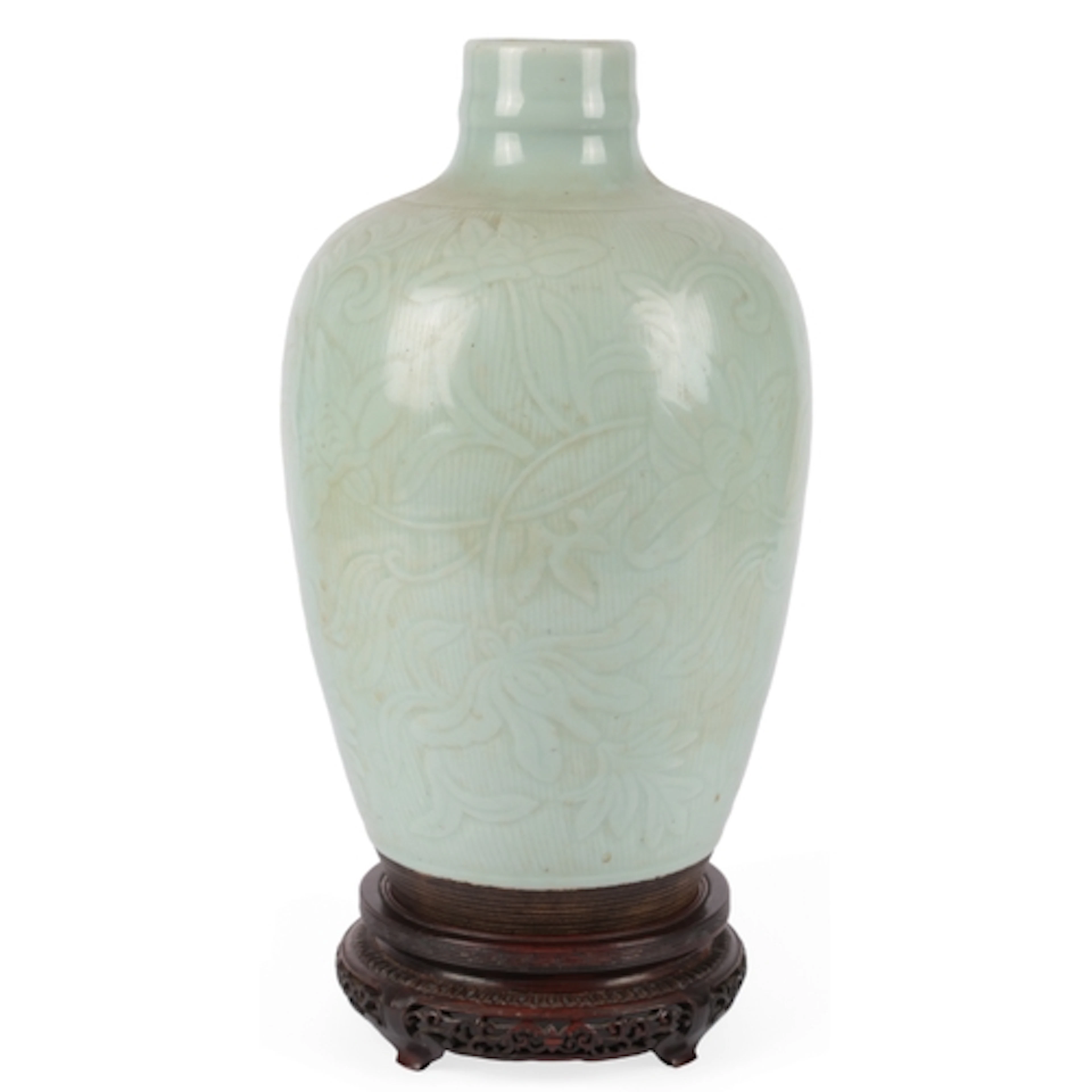 A Chinese carved celadon glazed vase, 19th century, in imita...