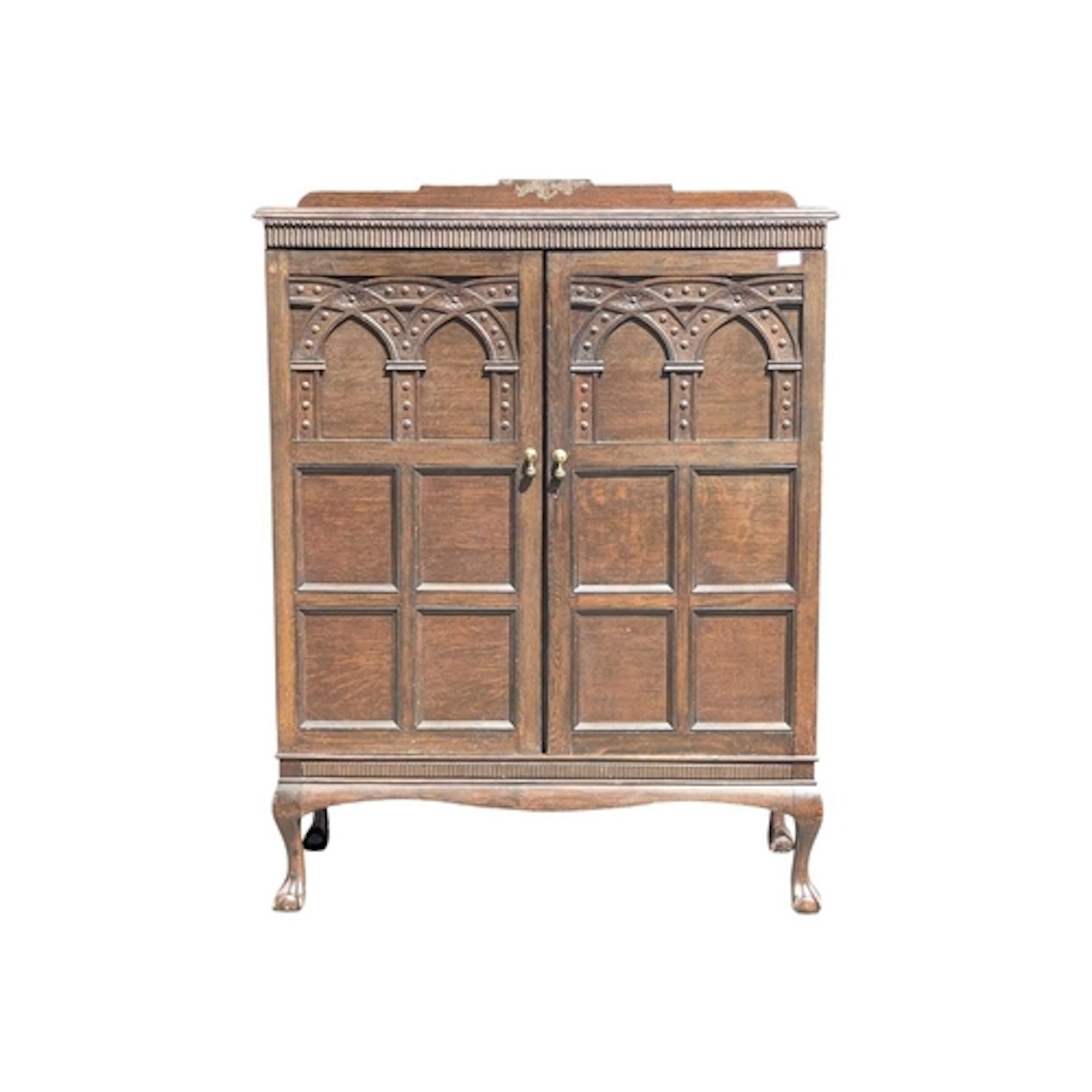 A Gothic Revival late 20th century oak wine / bottle cabinet...