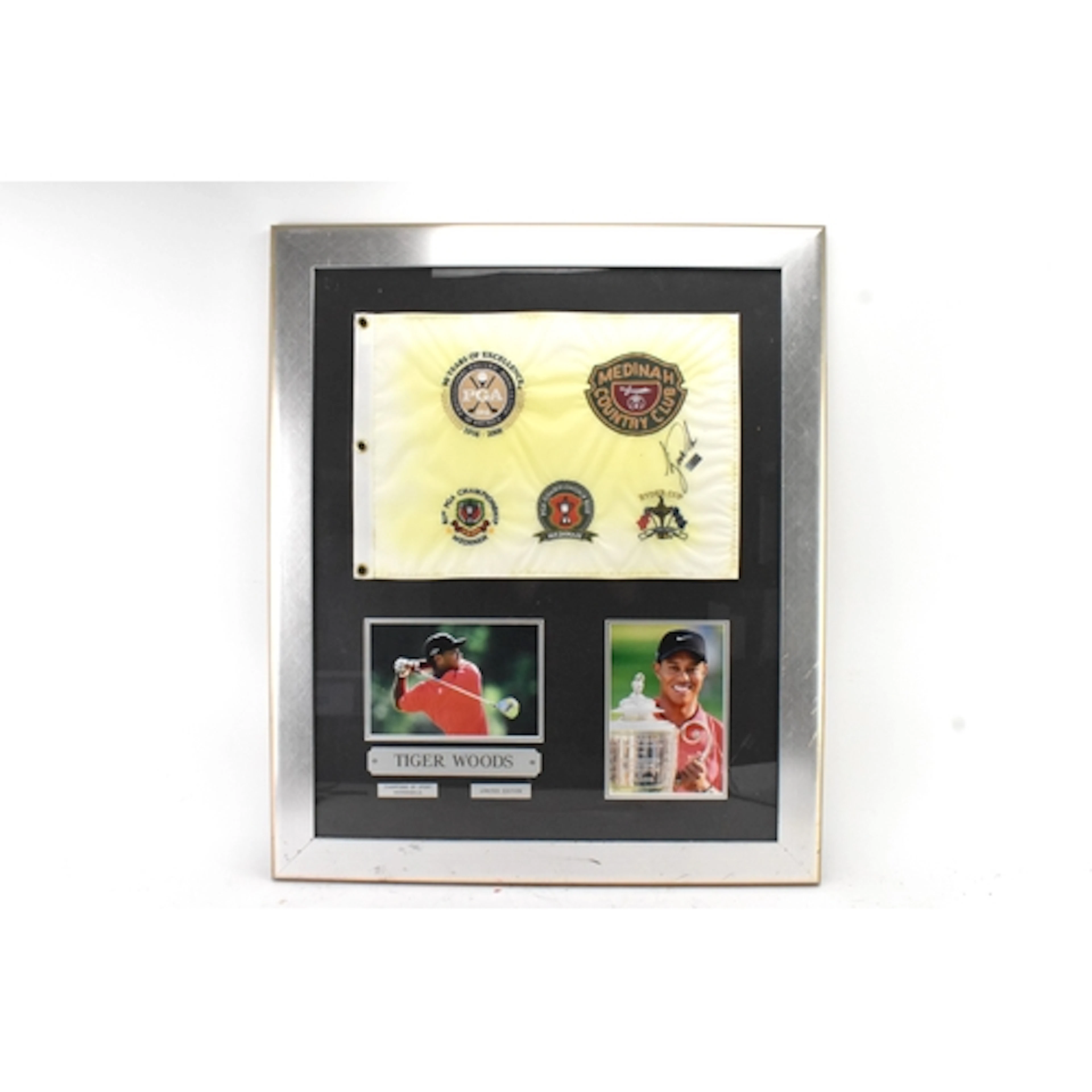 A framed Tiger Woods signed golf presentation display, compr...