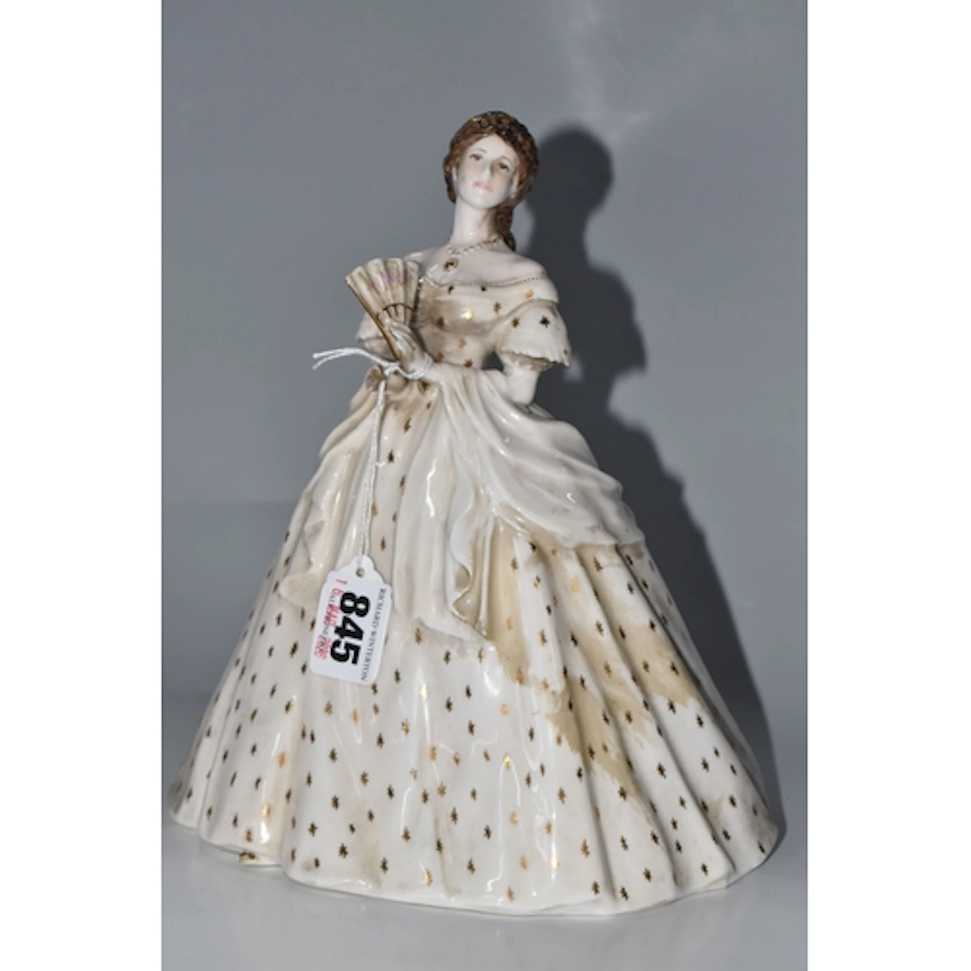 A ROYAL WORCESTER 'ELIZABETH, EMPRESS OF AUSTRIA' FIGURINE, ...