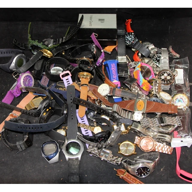 A large collection of ladies and gents fashion watches. All ...