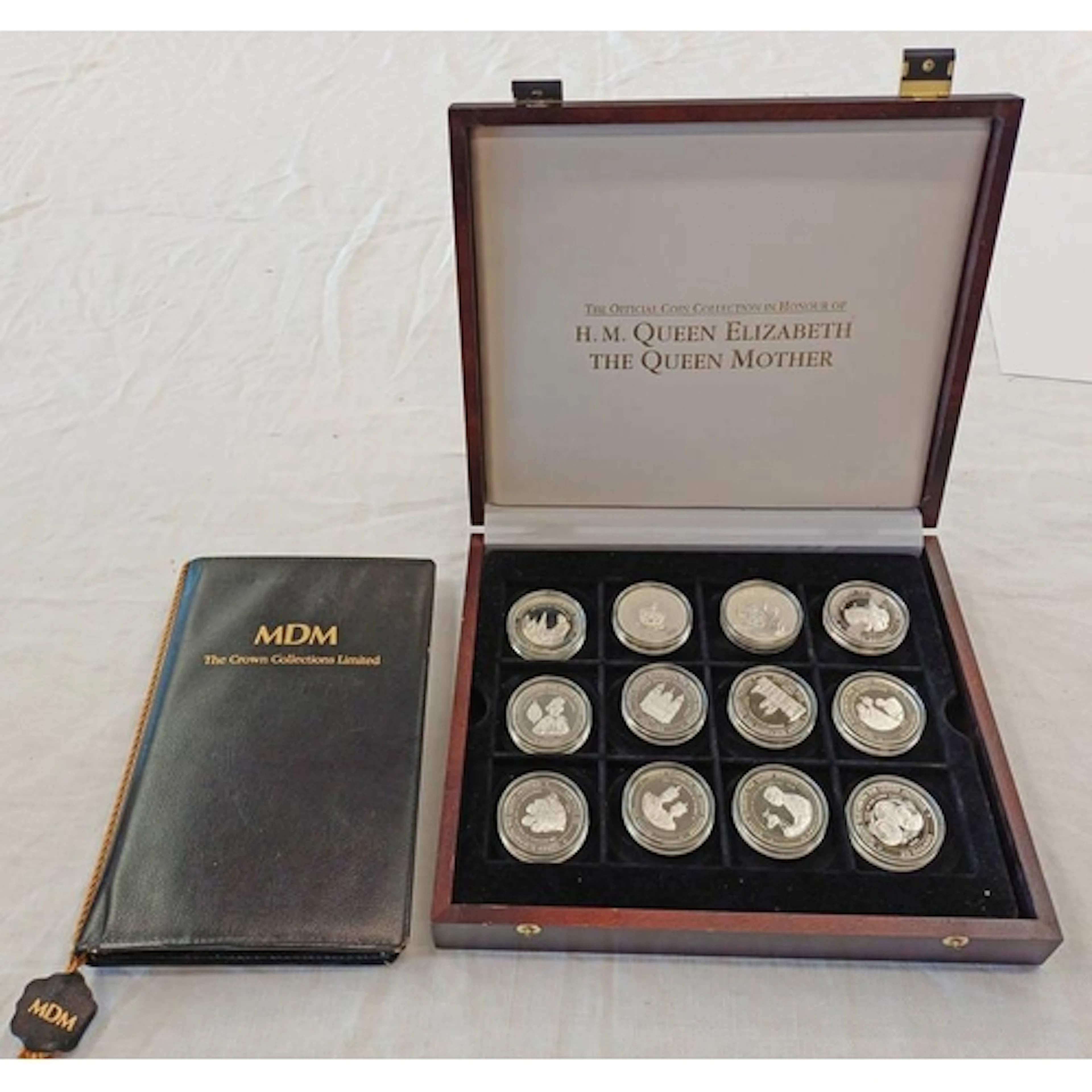 THE OFFICIAL COIN COLLECTION IN HONOUR OF H.M. QUEEN ELIZABE...